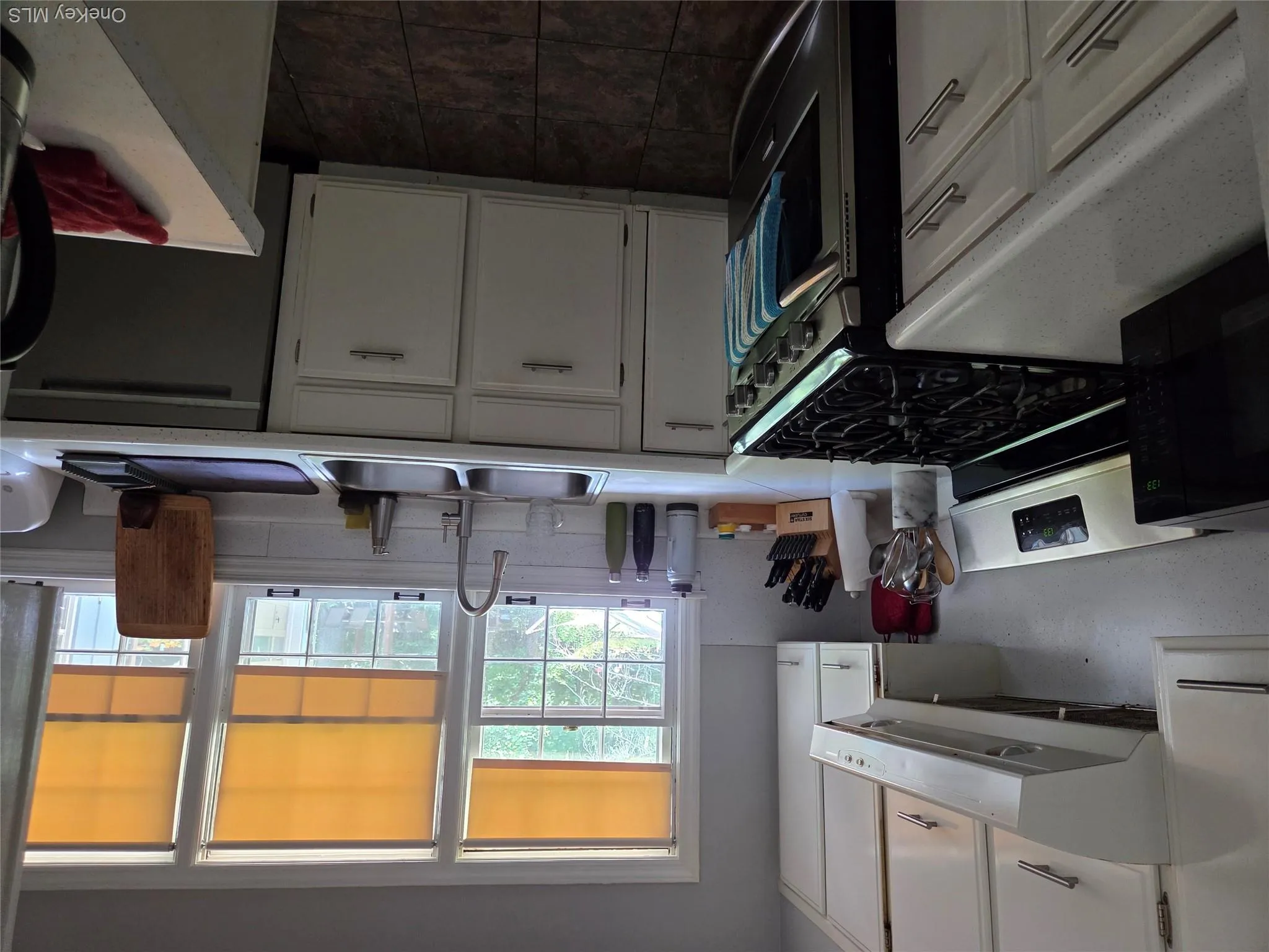 Another view of the Kitchen off the Living room area, Another view of the Kitchen off the Living room area,