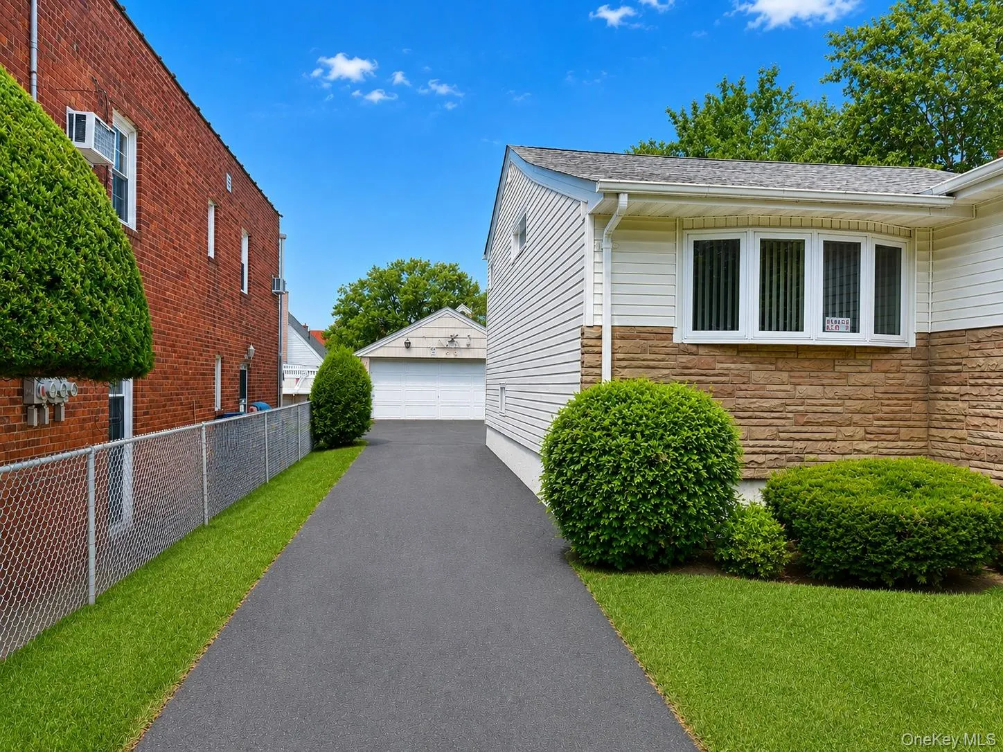 Private driveway leading to a two car garage. Private driveway leading to a two car garage.