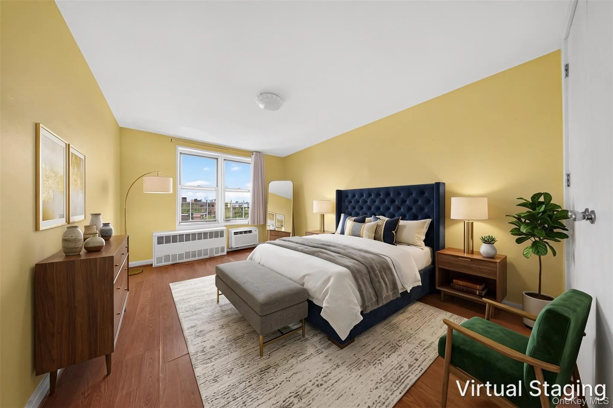 Bedroom featuring wood-finish flooring, a bright window, and a white ceiling Bedroom featuring wood-finish flooring, a bright window, and a white ceiling