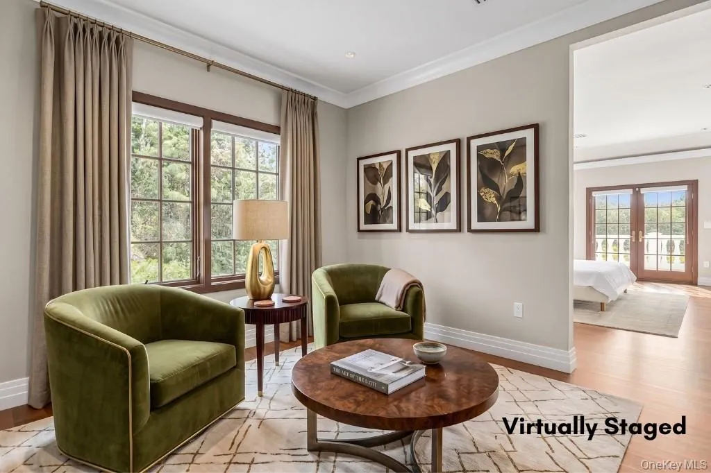 Sitting Room leading to Primary Suite, staged Sitting Room leading to Primary Suite, staged