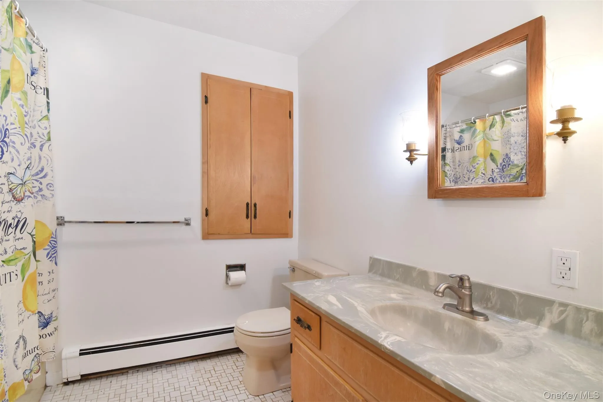 Hall Bath with built in linen closet.Bathtub. Hall Bath with built in linen closet.Bathtub.