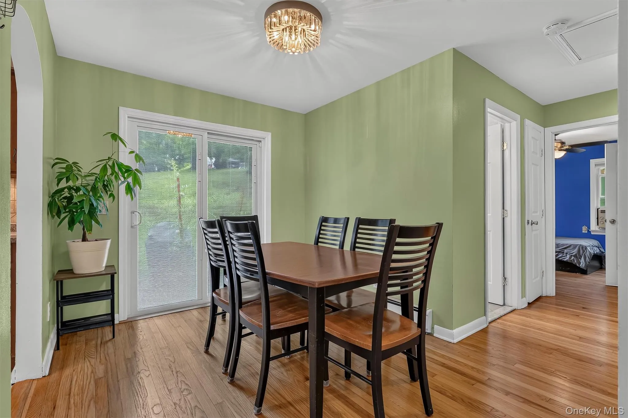 Dining room features sliding glass doors providing easy access to the patio and backyard. Dining room features sliding glass doors providing easy access to the patio and backyard.