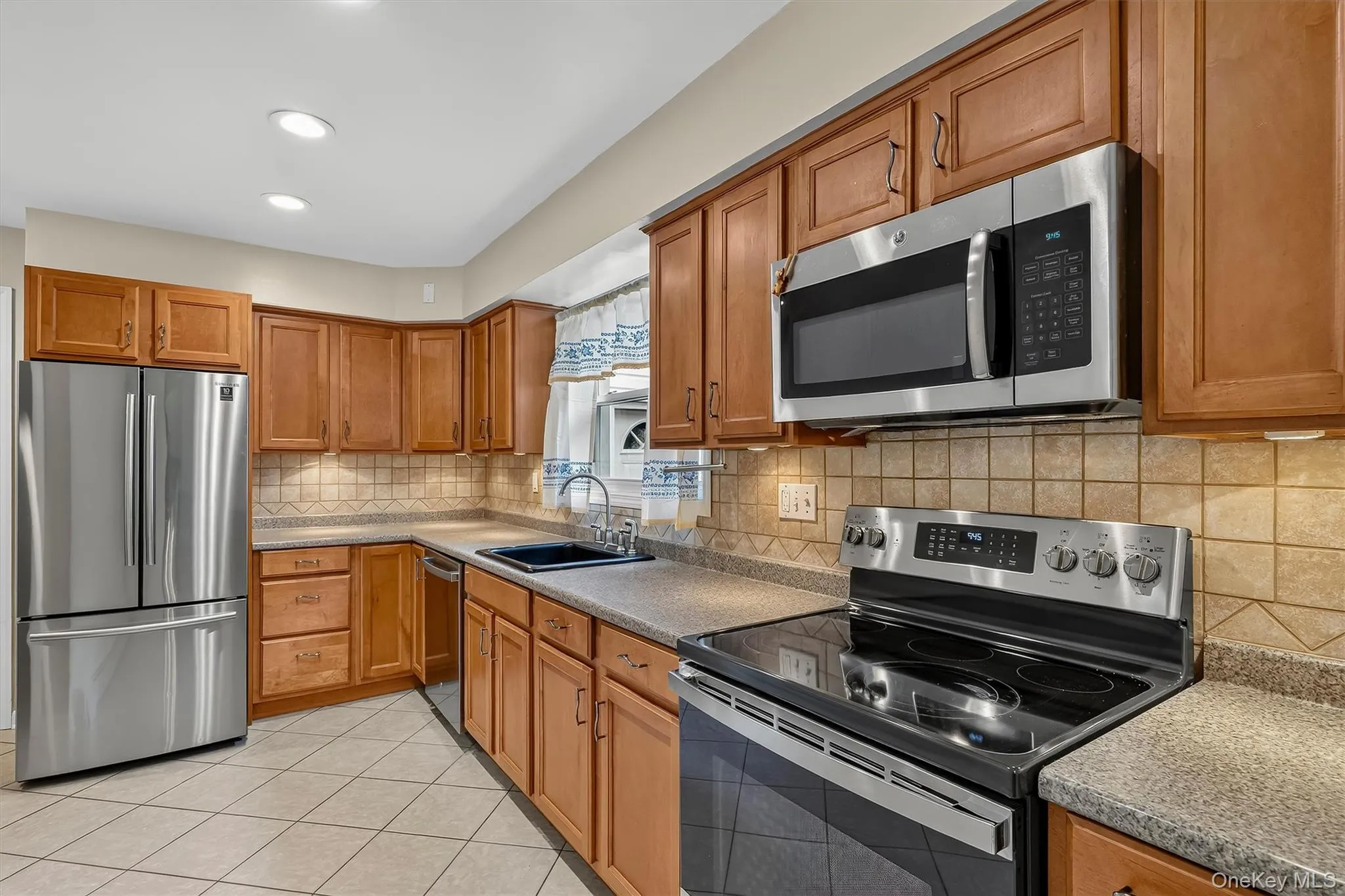 Well-appointed kitchen offers ample workspace and a comfortable layout for everyday cooking and entertaining. Well-appointed kitchen offers ample workspace and a comfortable layout for everyday cooking and entertaining.