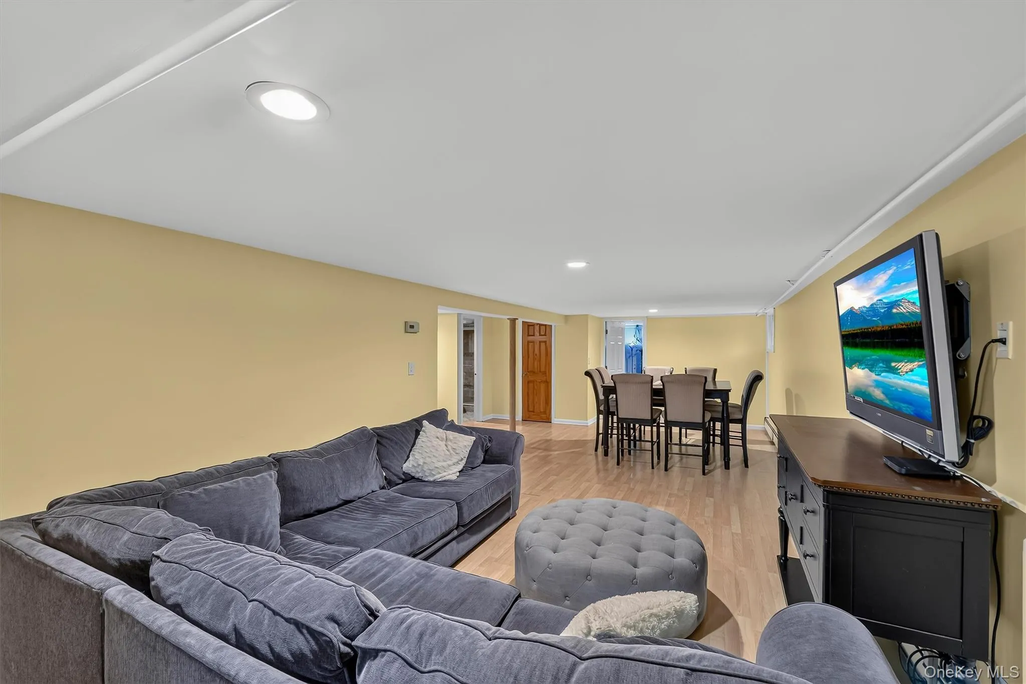 Inviting lower-level family room creates a versatile space for movie nights, game days, or simply unwinding. Inviting lower-level family room creates a versatile space for movie nights, game days, or simply unwinding.