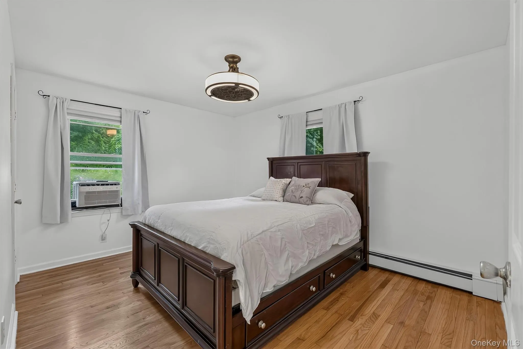 Spacious primary bedroom offers a comfortable and inviting retreat with plenty of natural light. Spacious primary bedroom offers a comfortable and inviting retreat with plenty of natural light.
