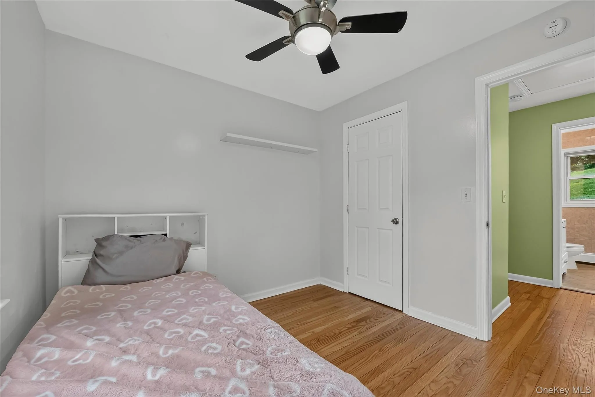 Bright and inviting second bedroom with view into the hallway. Bright and inviting second bedroom with view into the hallway.