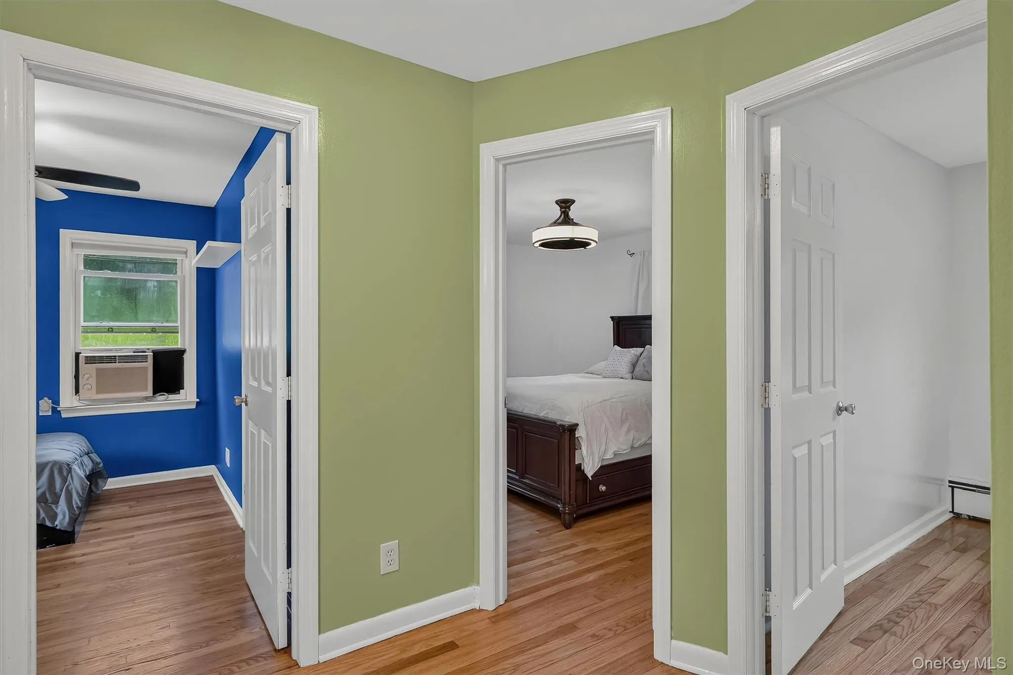 Main-level hallway provides easy access to all three bedrooms and the full bathroom. Main-level hallway provides easy access to all three bedrooms and the full bathroom.