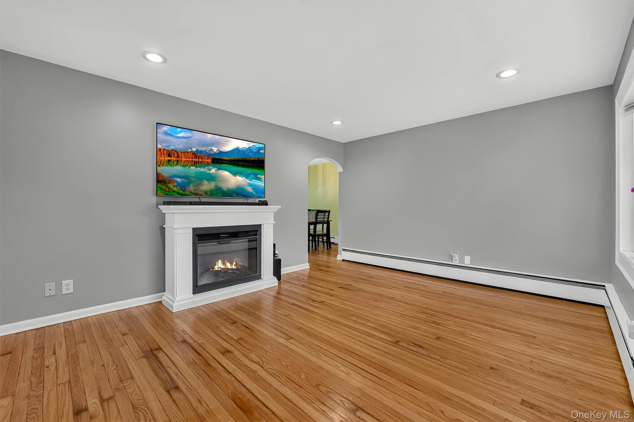 Open view from the living room into the dining room creates a comfortable flow between the main living spaces. Open view from the living room into the dining room creates a comfortable flow between the main living spaces.