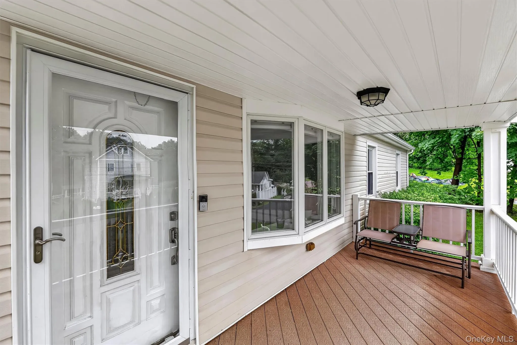 Relaxing front porch offers the perfect spot to enjoy your morning coffee or unwind. Relaxing front porch offers the perfect spot to enjoy your morning coffee or unwind.