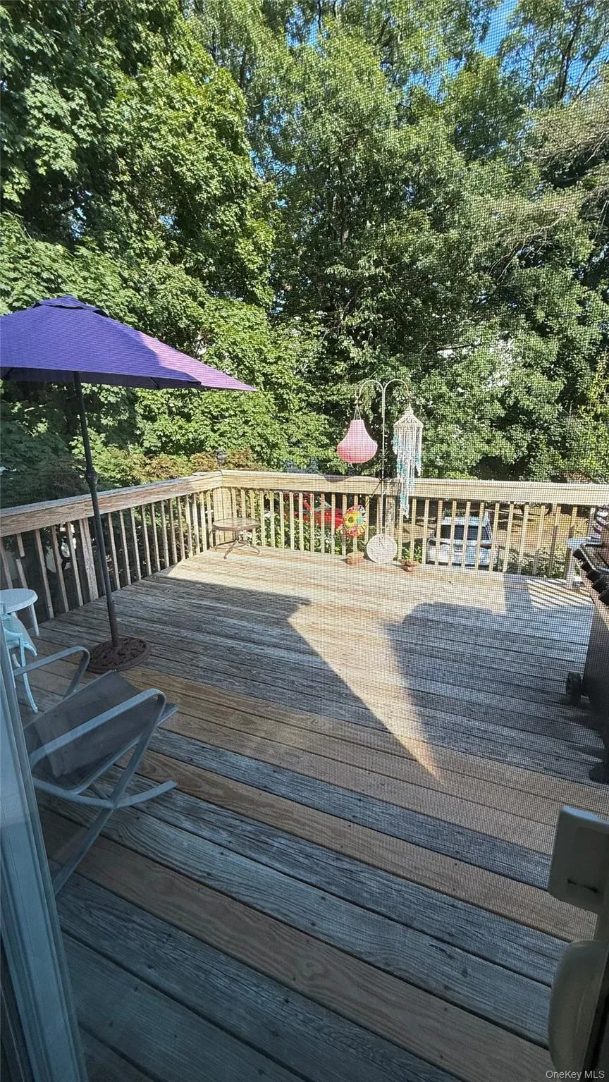 Extra large deck in the back of the house ,looking over your private large driveway Extra large deck in the back of the house ,looking over your private large driveway