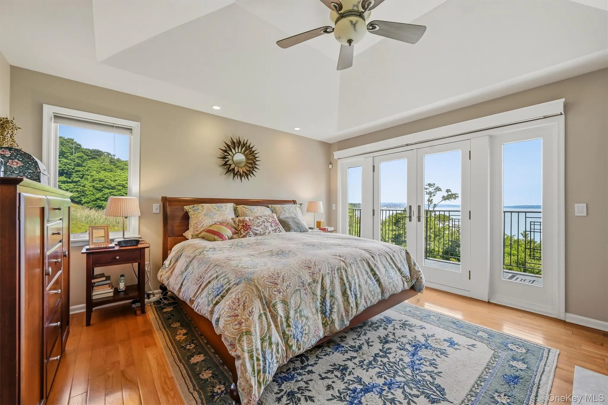 Primary Bedroom with Fireplace, Balcony, Walk-in Closet & Renovated Bath Primary Bedroom with Fireplace, Balcony, Walk-in Closet & Renovated Bath