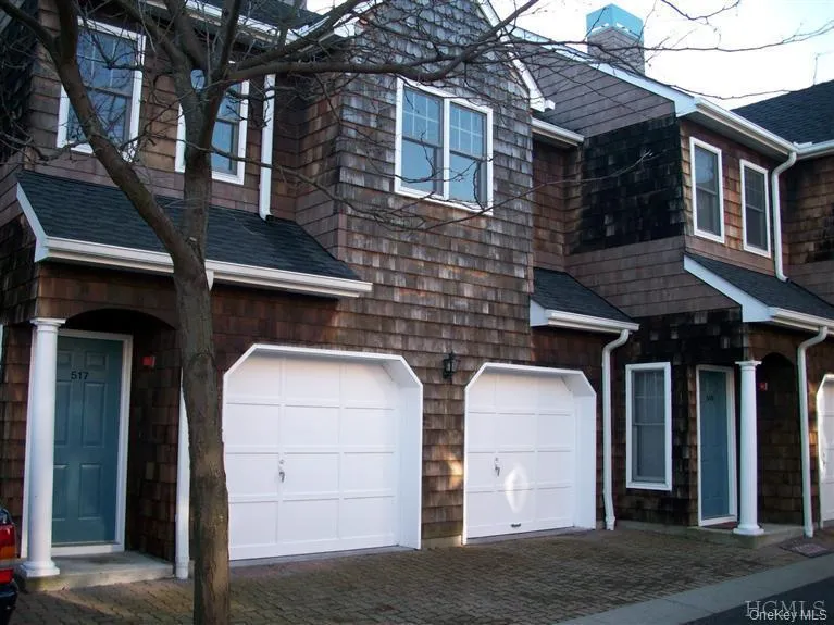 Attached one car garage and parking space. Attached one car garage and parking space.