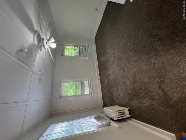 Spacious and bright room with new wall-to-wall carpet, newly painted, ceiling fan and window A/C Spacious and bright room with new wall-to-wall carpet, newly painted, ceiling fan and window A/C