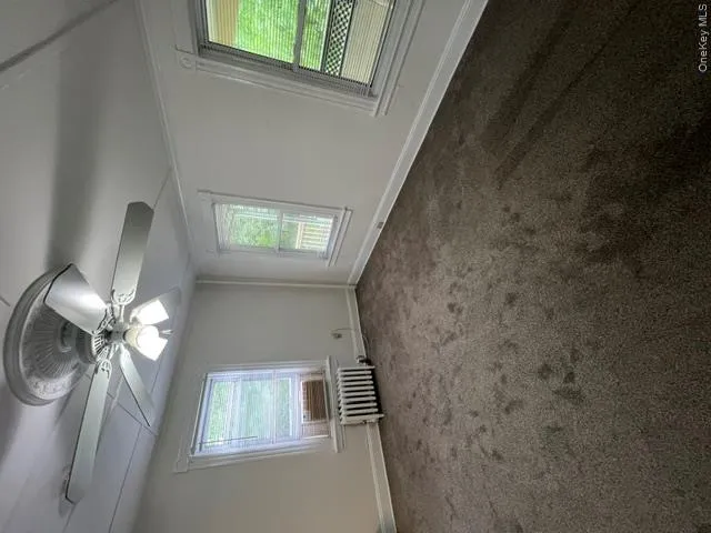 Windows for natural light, window A/C, ceiling fan Windows for natural light, window A/C, ceiling fan