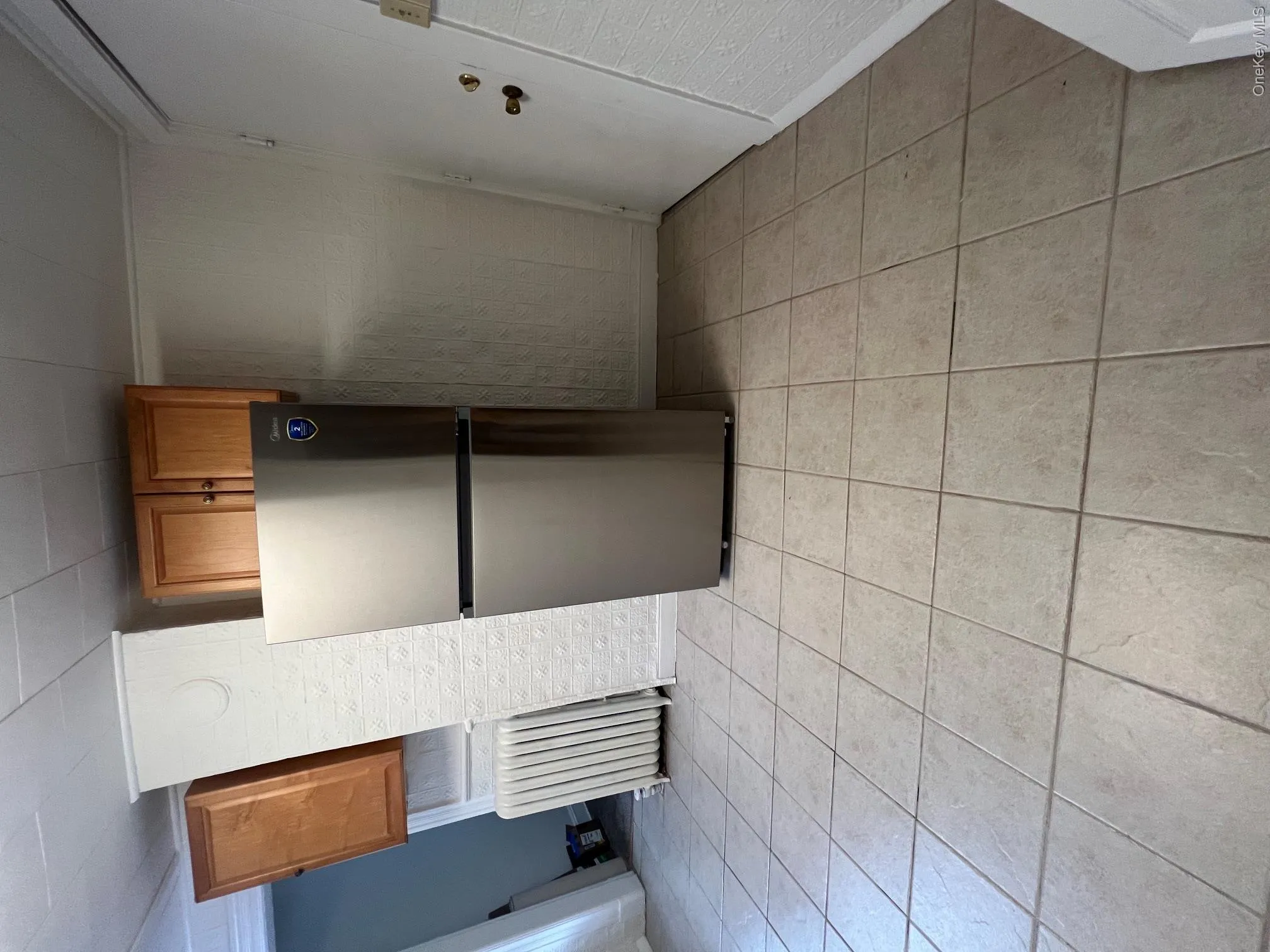 Just Painted, tiled floor, new refrigerator Just Painted, tiled floor, new refrigerator