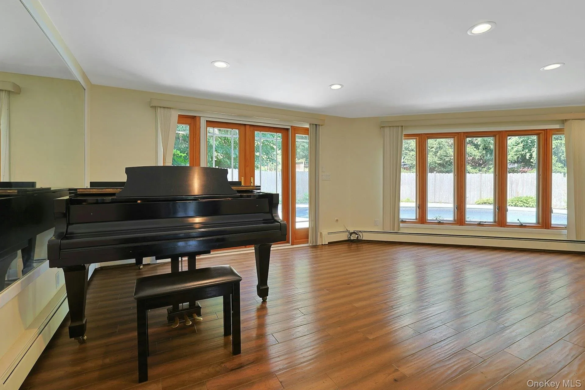 Off of the primary bedroom is this flexible space. A wonderful family room now, doors here also open to the pool. Off of the primary bedroom is this flexible space. A wonderful family room now, doors here also open to the pool.