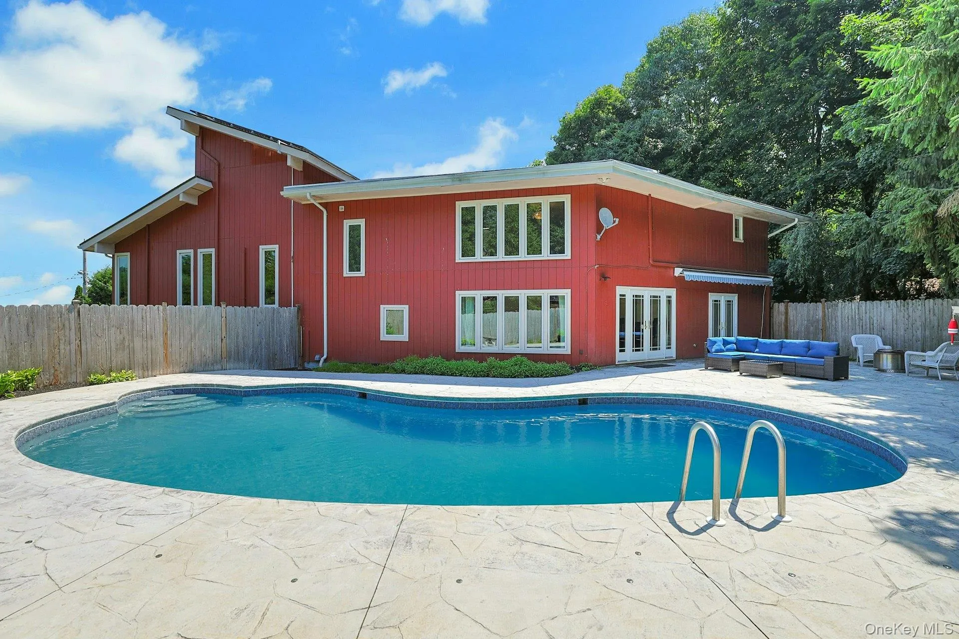 The large back patio around the pool has many seating areas. Whether you are relaxing on your own or bringing everyone over for a party, this is the spot! The large back patio around the pool has many seating areas. Whether you are relaxing on your own or bringing everyone over for a party, this is the spot!