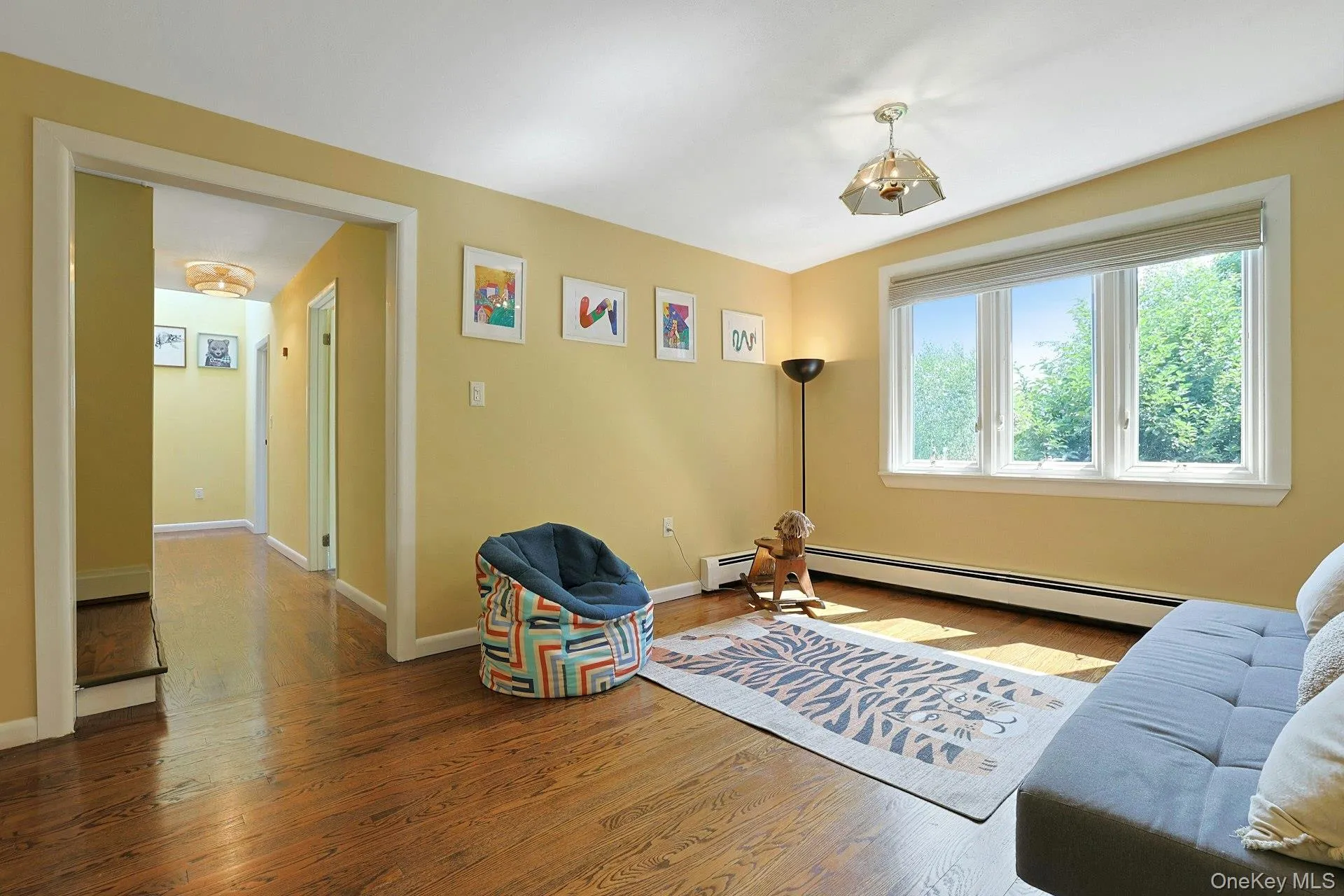 Back upstairs, to the third level, here we are in the playroom. It could also be a great library or open office space. Back upstairs, to the third level, here we are in the playroom. It could also be a great library or open office space.