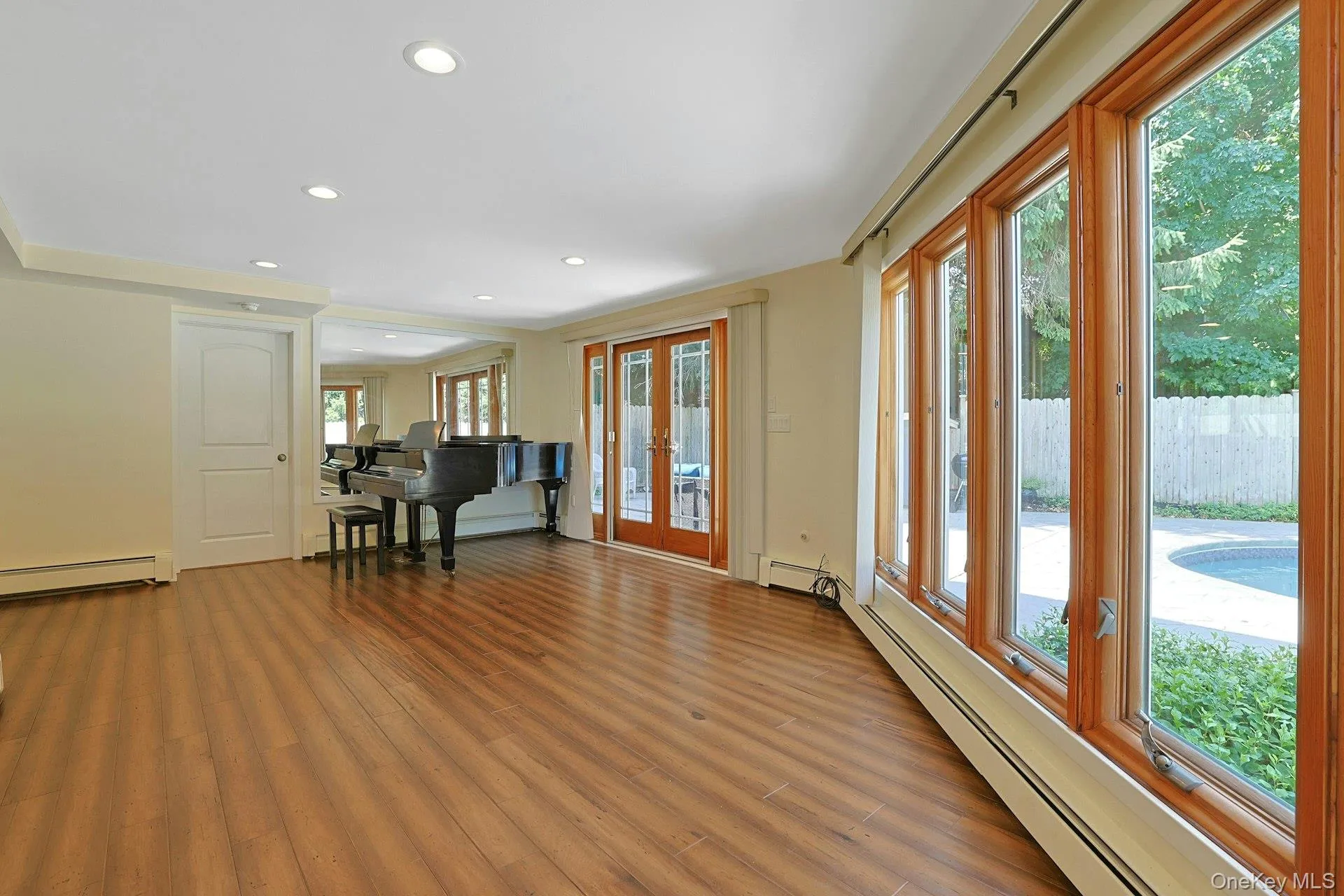 As throughout most of the home, this room is graced by hardwood floors in perfect condition. As throughout most of the home, this room is graced by hardwood floors in perfect condition.