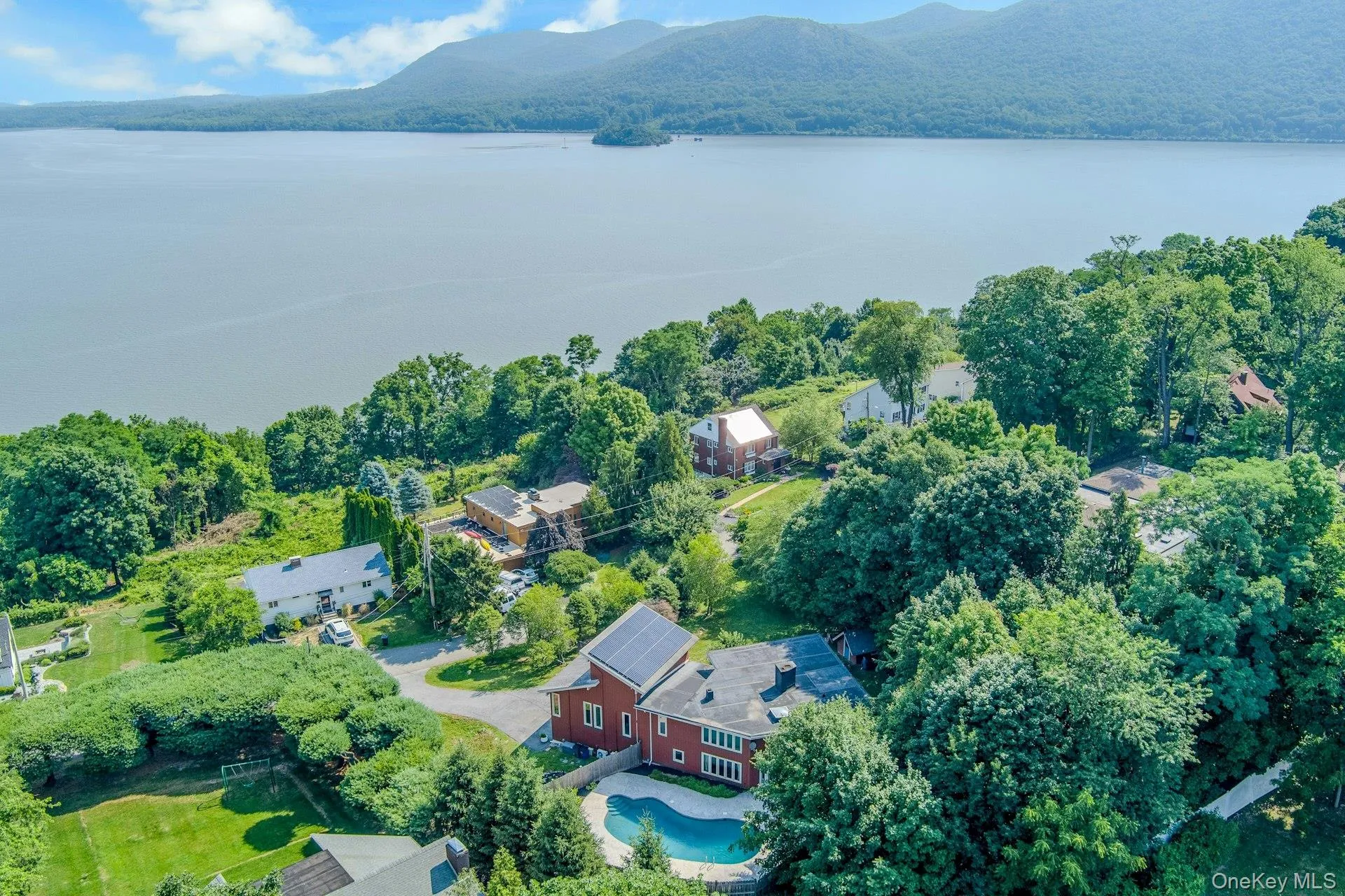 Rising even further, we look out to the beautiful Hudson River, on whose bluff this home sits. Rising even further, we look out to the beautiful Hudson River, on whose bluff this home sits.