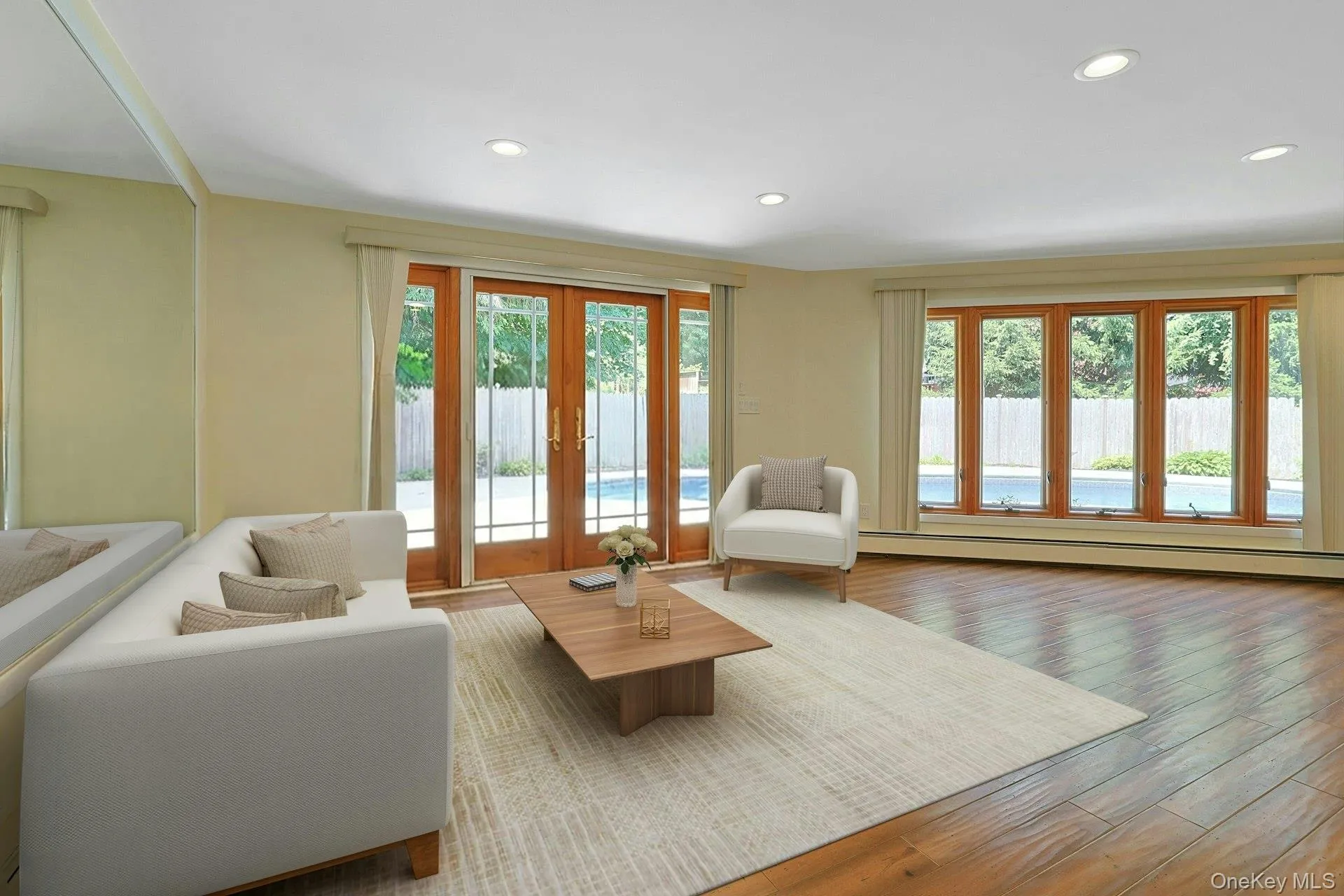 Off of the primary bedroom is this flexible space. A wonderful family room now, doors here also open to the pool. The lass doors and wall of windows ensure this is a bright, cheerful space. Off of the primary bedroom is this flexible space. A wonderful family room now, doors here also open to the pool. The lass doors and wall of windows ensure this is a bright, cheerful space.