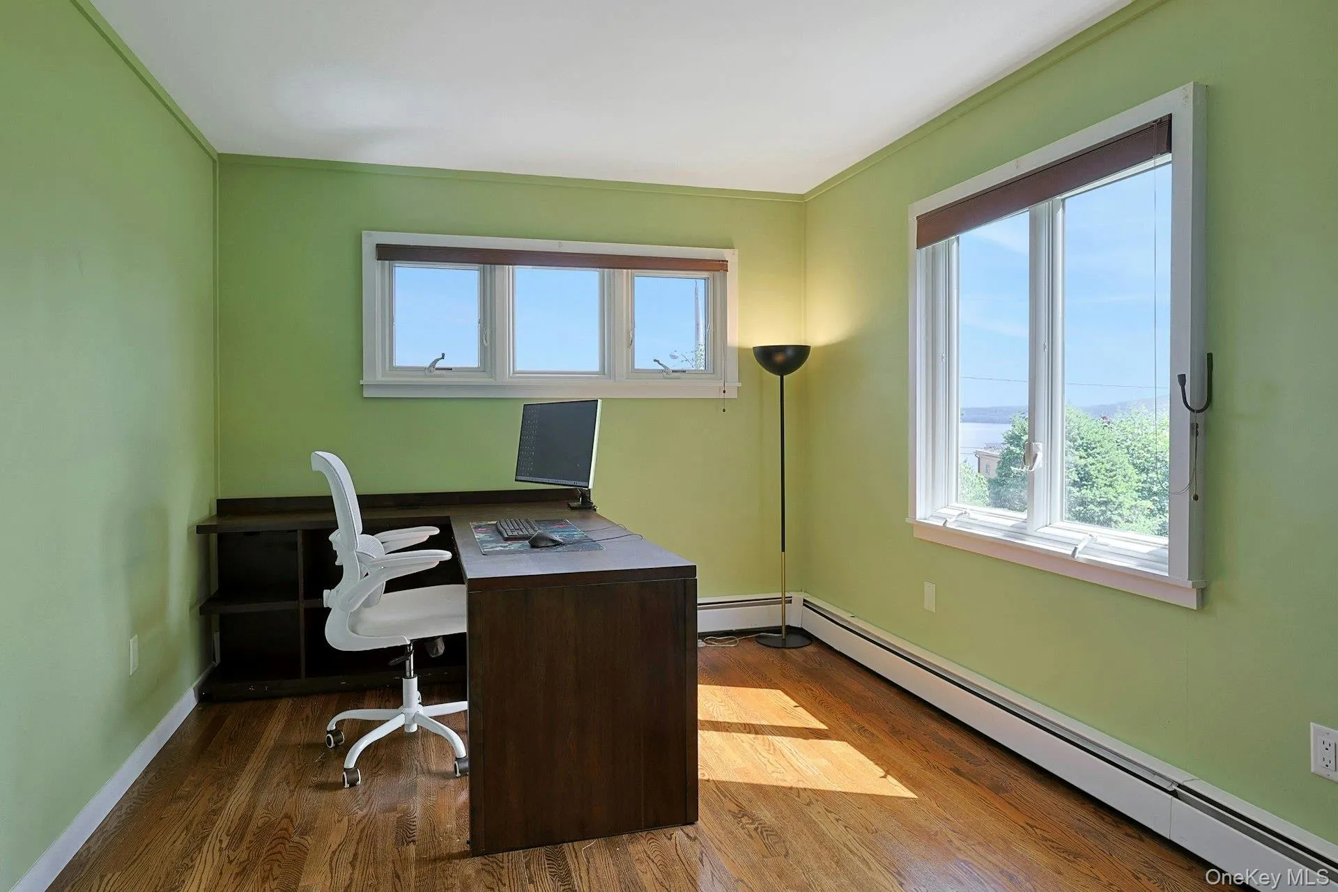 The long office has great views of the river. This flexible space could also be used as a bedroom. The long office has great views of the river. This flexible space could also be used as a bedroom.