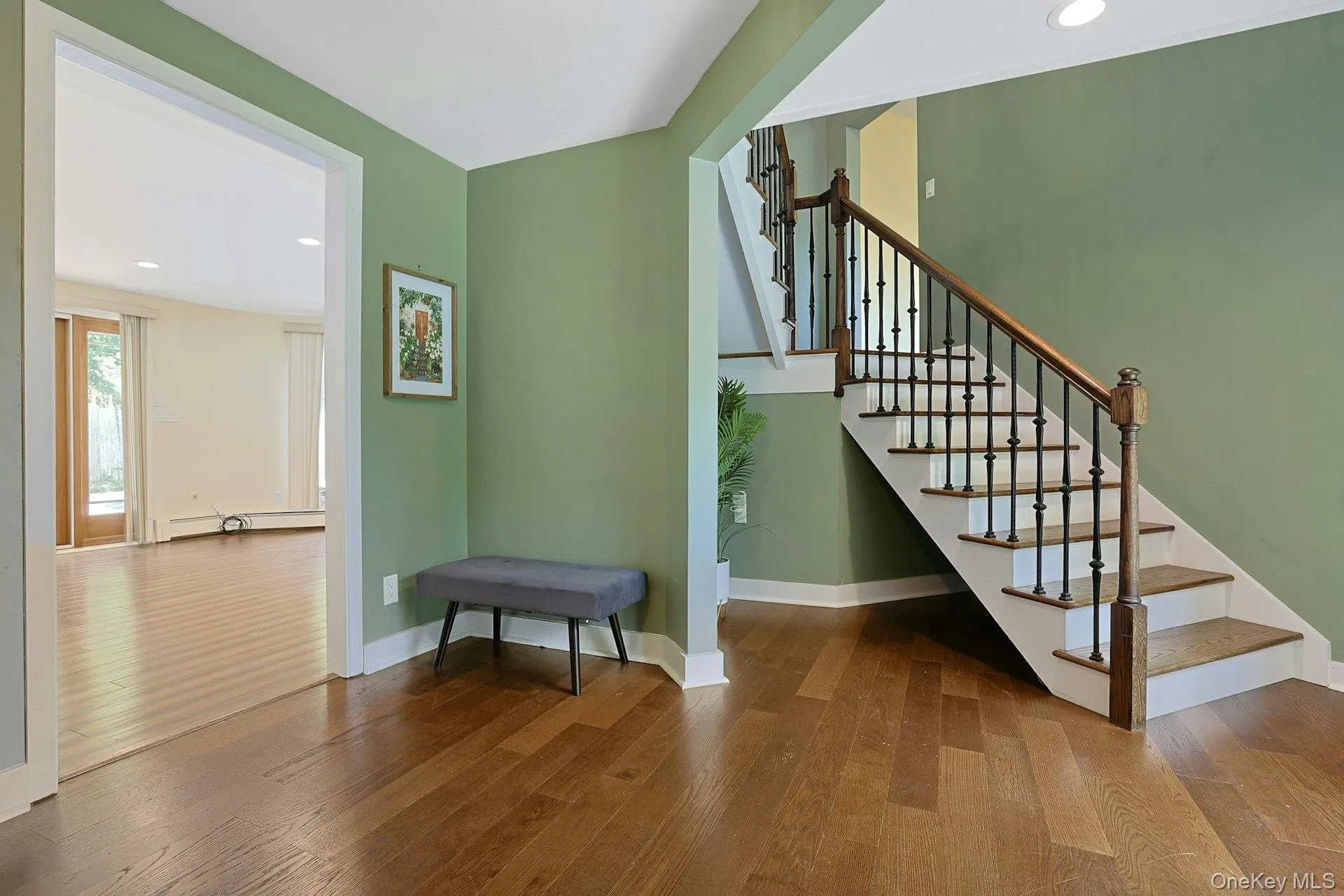 Back downstairs, the foyer is a lovely entrance to the home. Off screen to the left is a convenient hall closet. Back downstairs, the foyer is a lovely entrance to the home. Off screen to the left is a convenient hall closet.