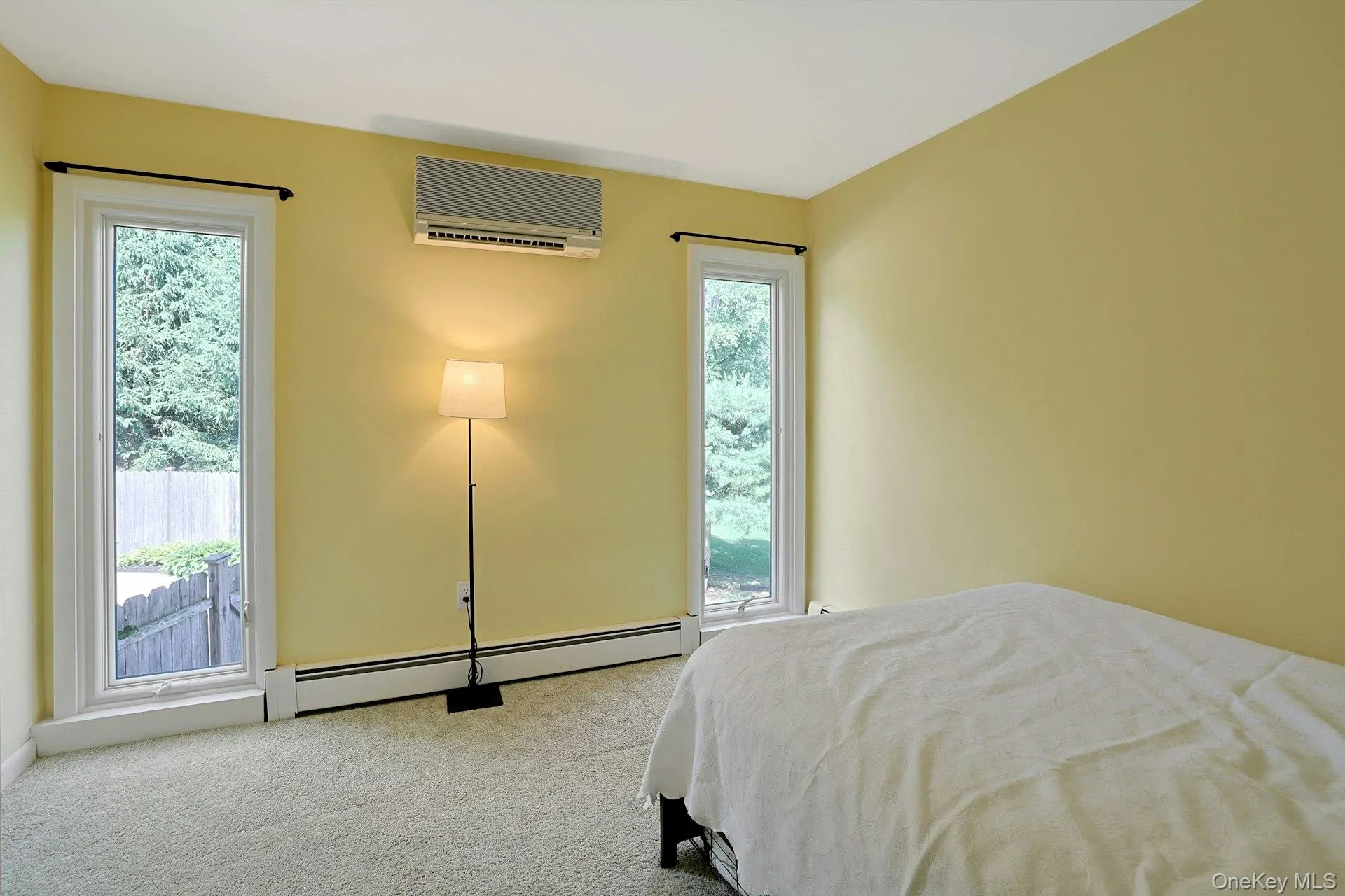 The third bedroom, with comfortable carpet underfoot, overlooks the pool. The third bedroom, with comfortable carpet underfoot, overlooks the pool.