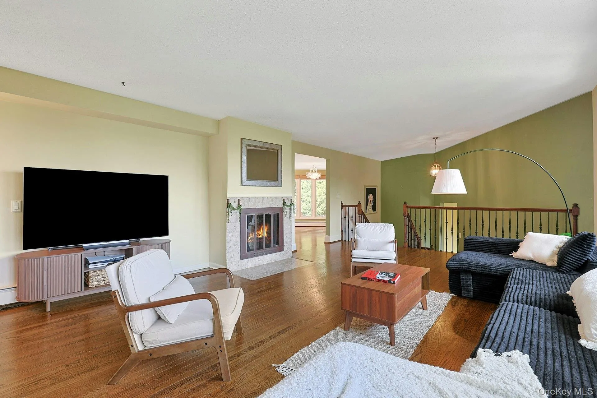 While the view is the biggest star here, the wood-burning fireplace that centers the room is no slouch. While the view is the biggest star here, the wood-burning fireplace that centers the room is no slouch.