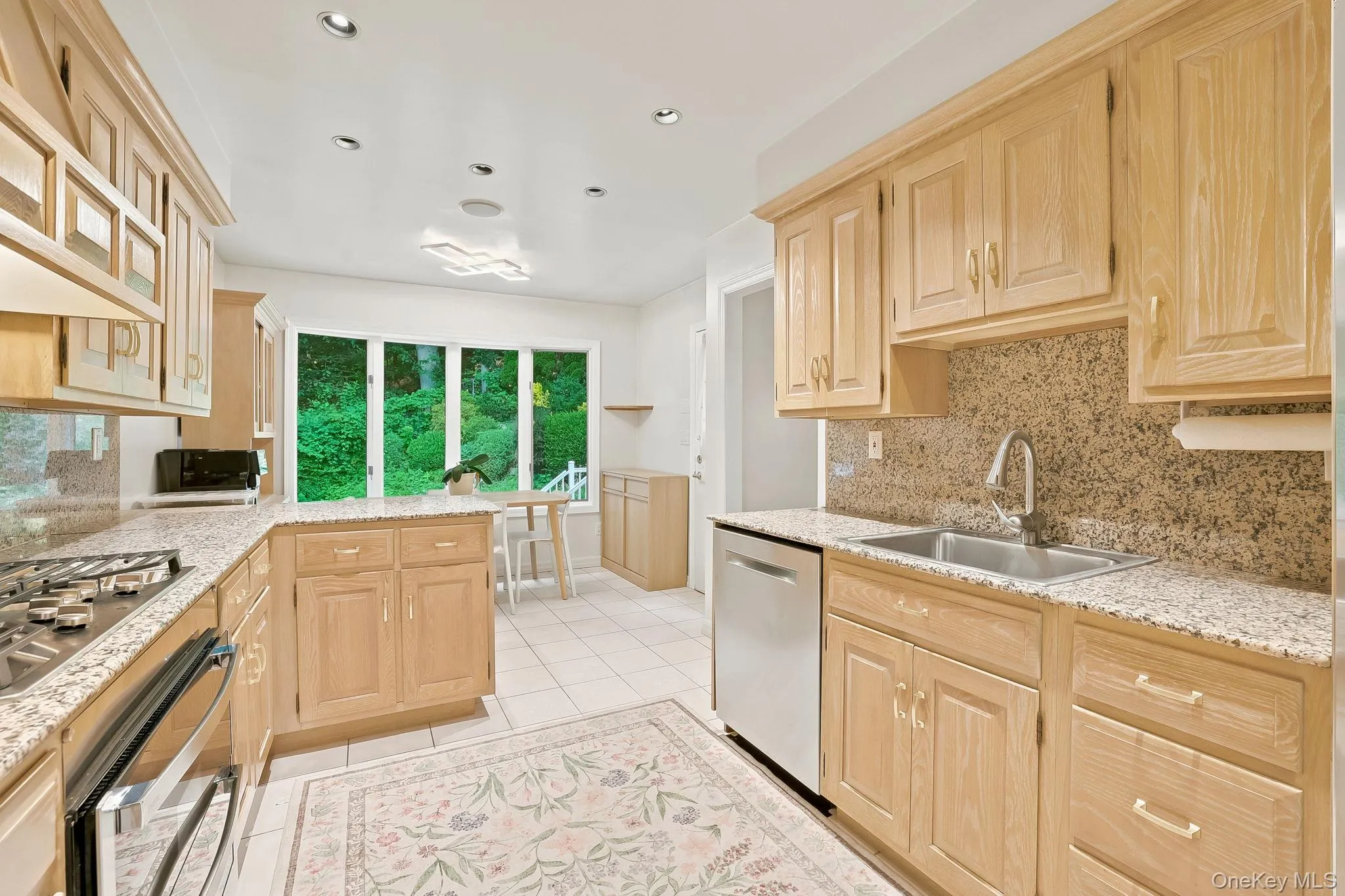 spacious eat in kitchen with sliding doors to the deck. spacious eat in kitchen with sliding doors to the deck.