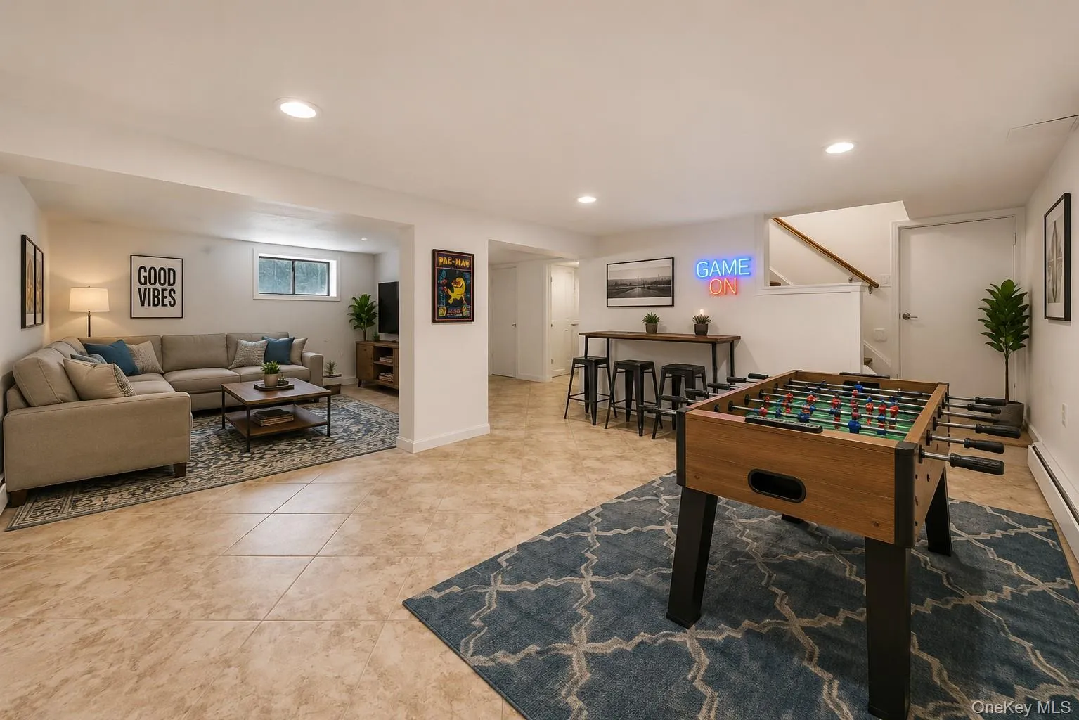 Finished lower level featuring recessed lighting, a window, tile flooring, and a built-in bar area Finished lower level featuring recessed lighting, a window, tile flooring, and a built-in bar area