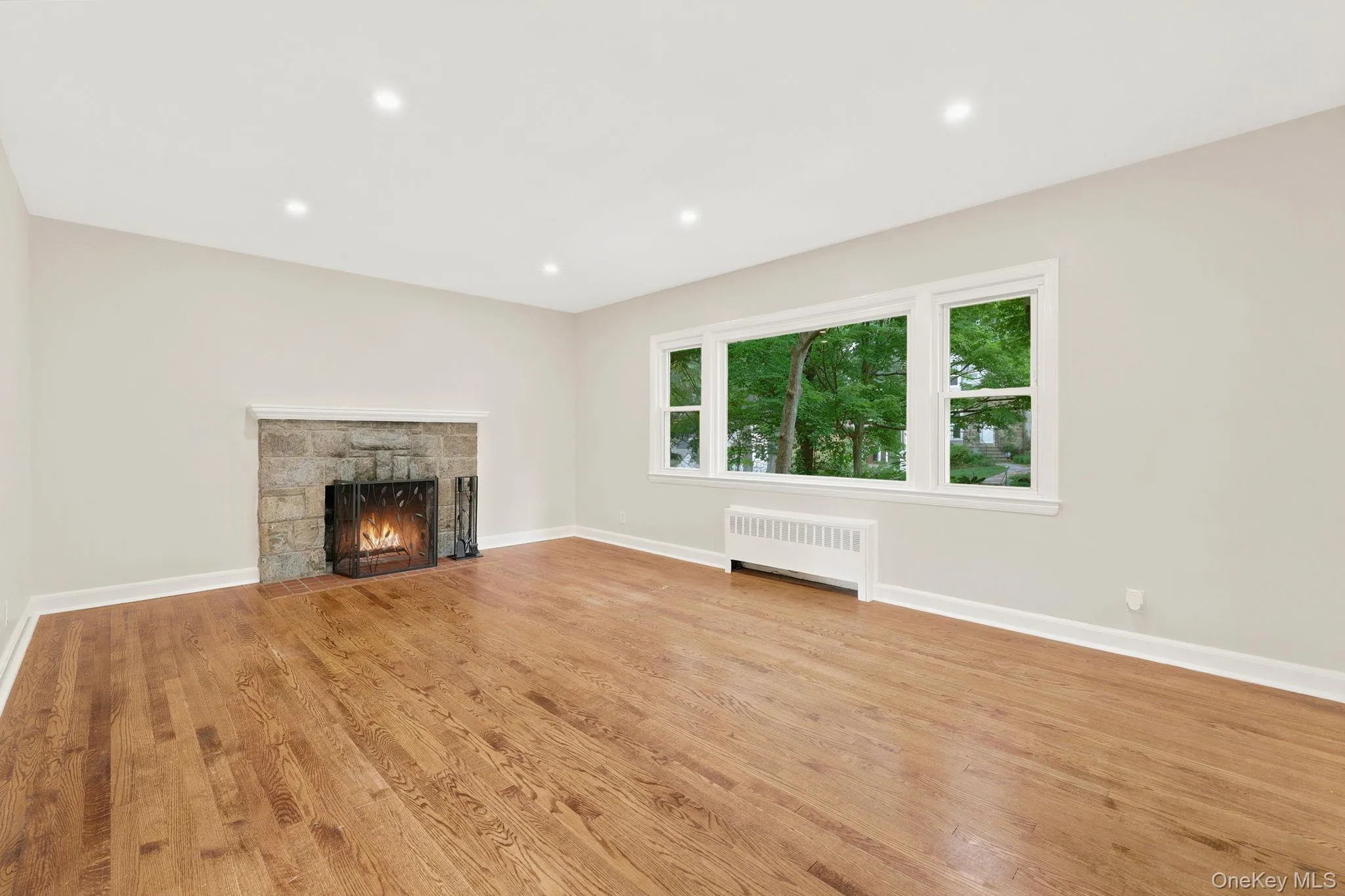 Living Room with Wood Burning Fireplace Living Room with Wood Burning Fireplace