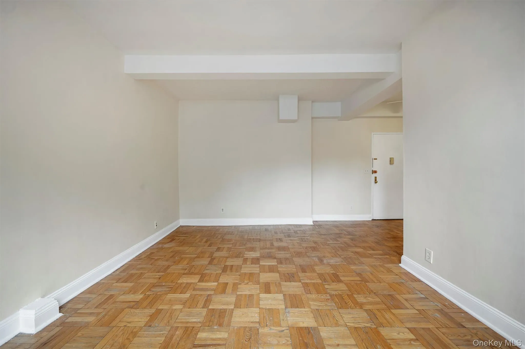 Living area space with view of front door. Living area space with view of front door.