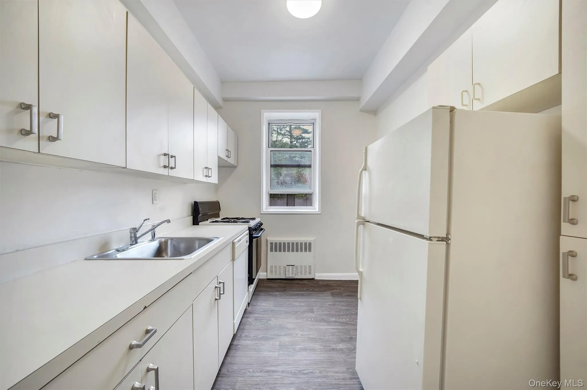 Kitchen with large window Kitchen with large window