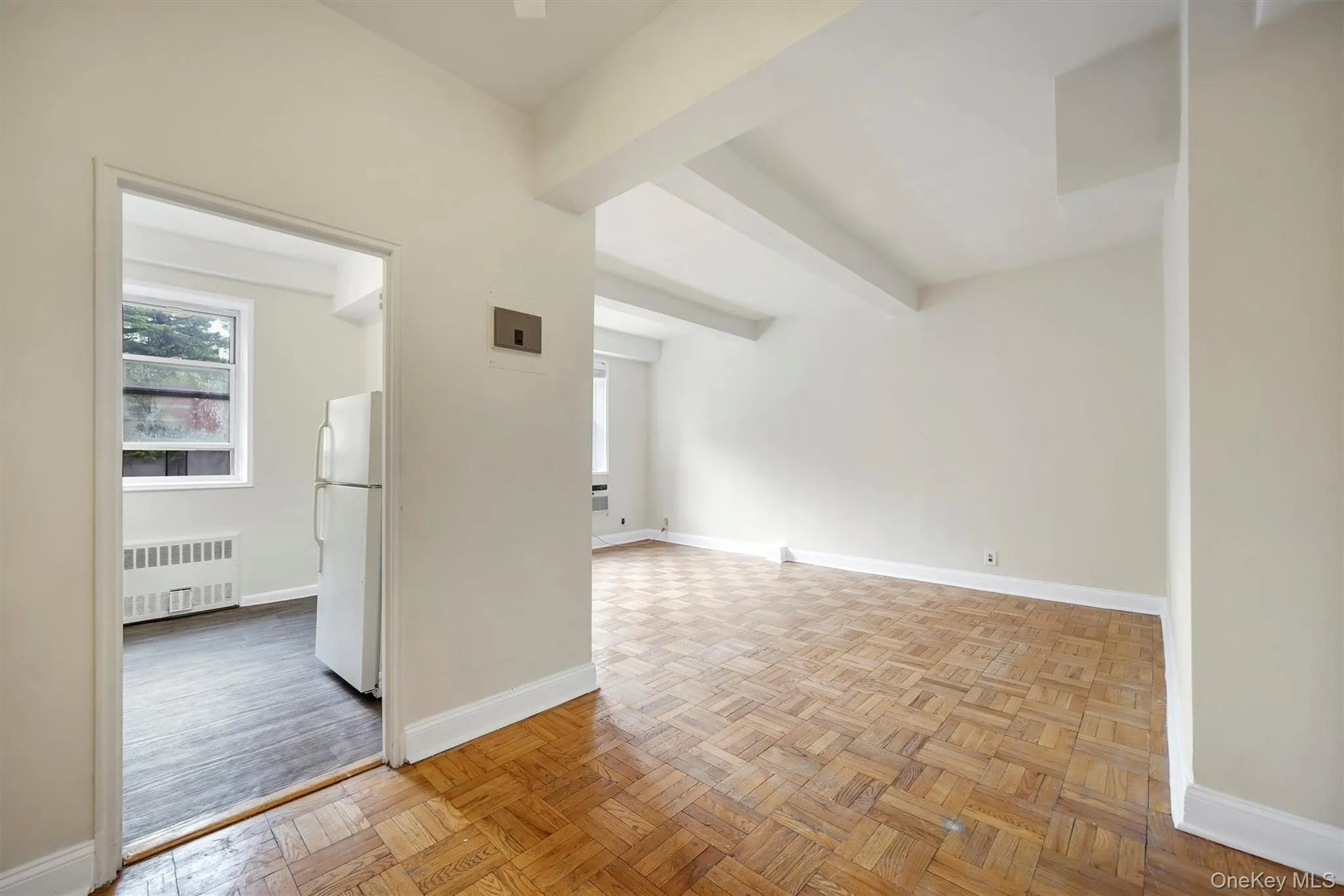 Entry way into large studio.Left is dressing area and bathroom.Right is living/dining area.In front of entry is large full size kitchen Entry way into large studio.Left is dressing area and bathroom.Right is living/dining area.In front of entry is large full size kitchen