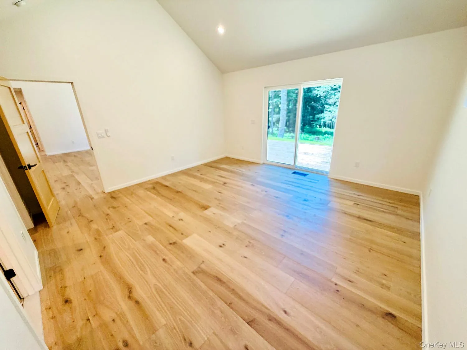 Primary bedroom has a sliding glass door which opens to the deck Primary bedroom has a sliding glass door which opens to the deck