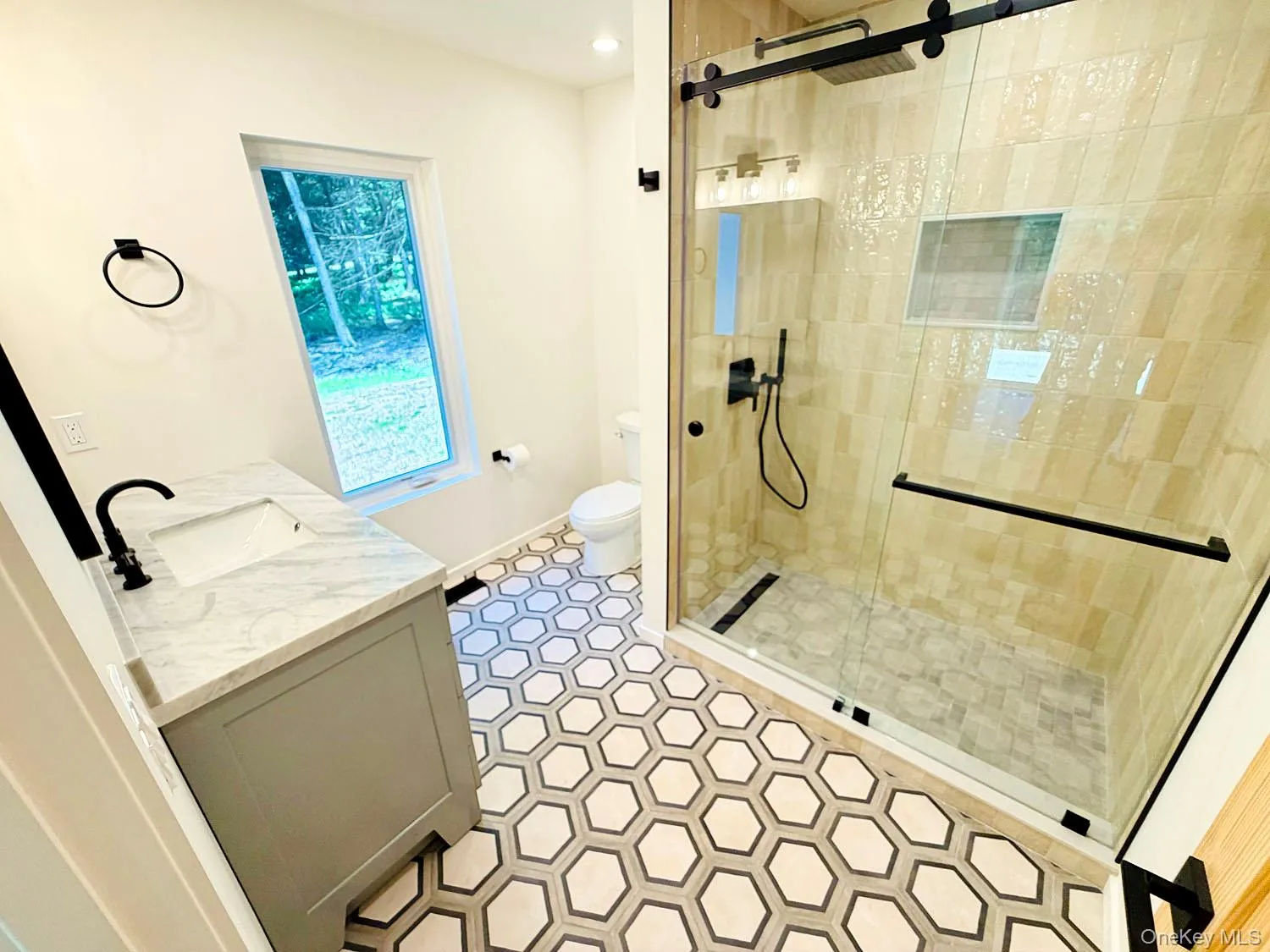 Gorgeous tiled shower and lovely decorative tile. Gorgeous tiled shower and lovely decorative tile.