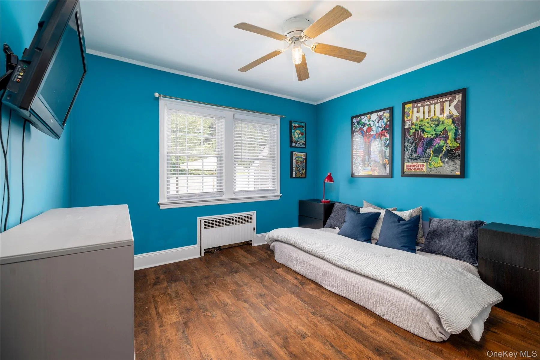 Bedroom with wood flooring Bedroom with wood flooring