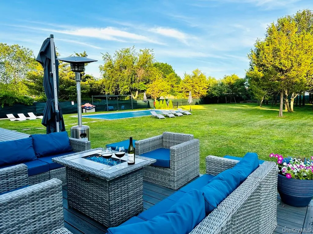 Large deck with assigned sitting areas for lounging, eating and pool relax Large deck with assigned sitting areas for lounging, eating and pool relax