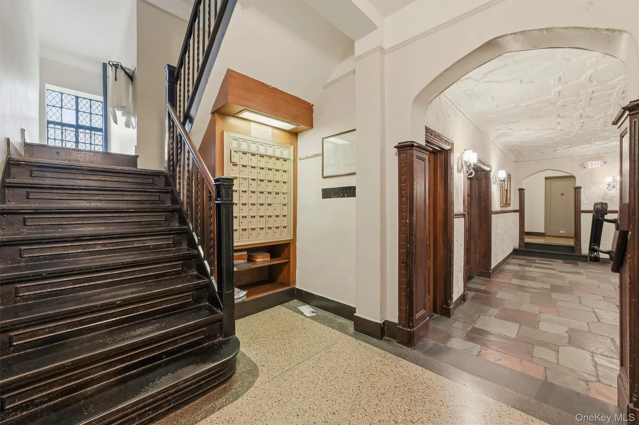 Mailboxes - open stairwell to upper floors Mailboxes - open stairwell to upper floors