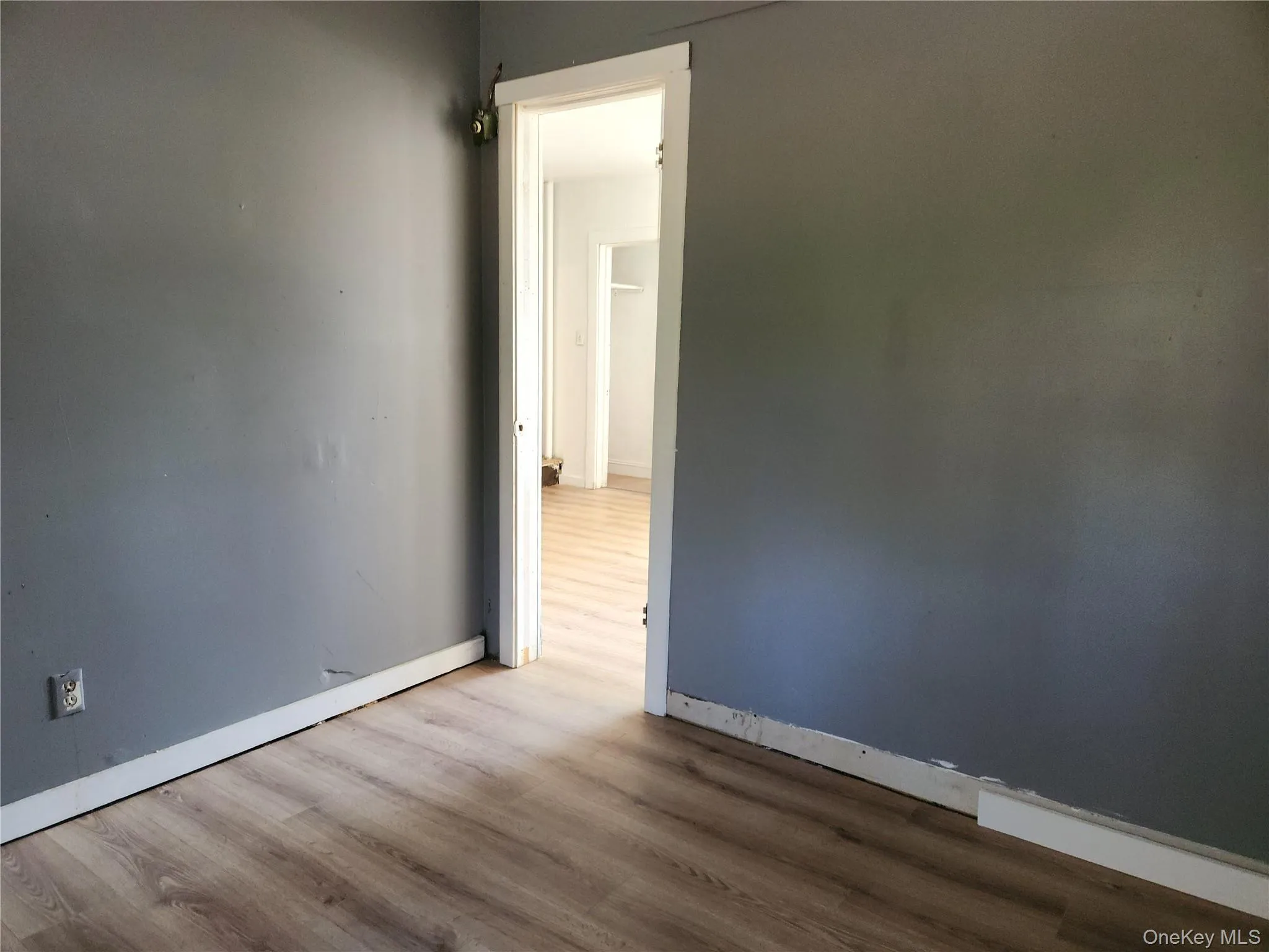2nd bedroom with laminate wood finished floors 2nd bedroom with laminate wood finished floors