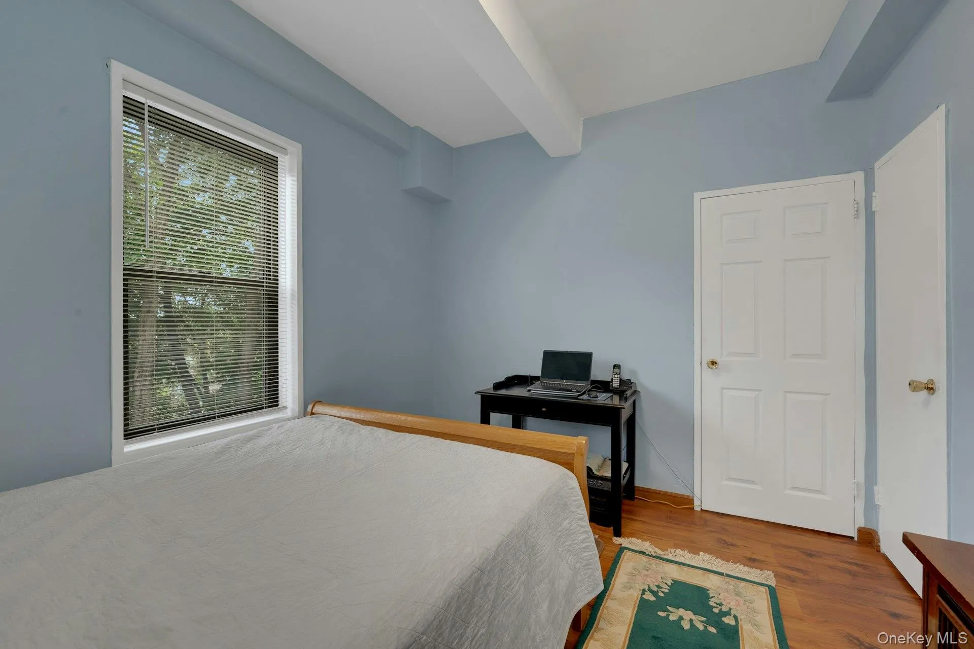 Bedroom 2 with large window, facing doors. Bedroom 2 with large window, facing doors.