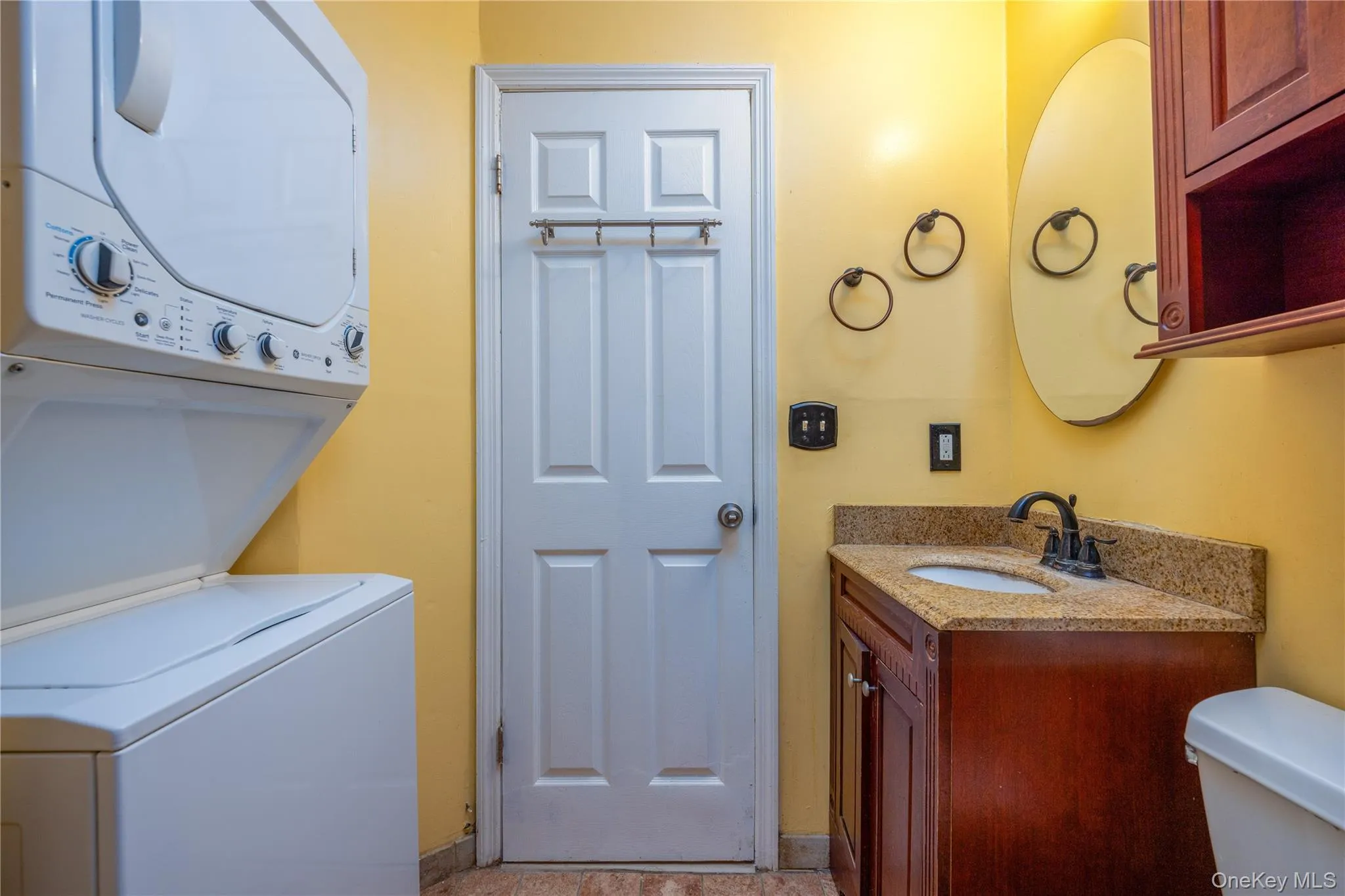 Stackable washer/dryer combo in bathroom 2 Stackable washer/dryer combo in bathroom 2