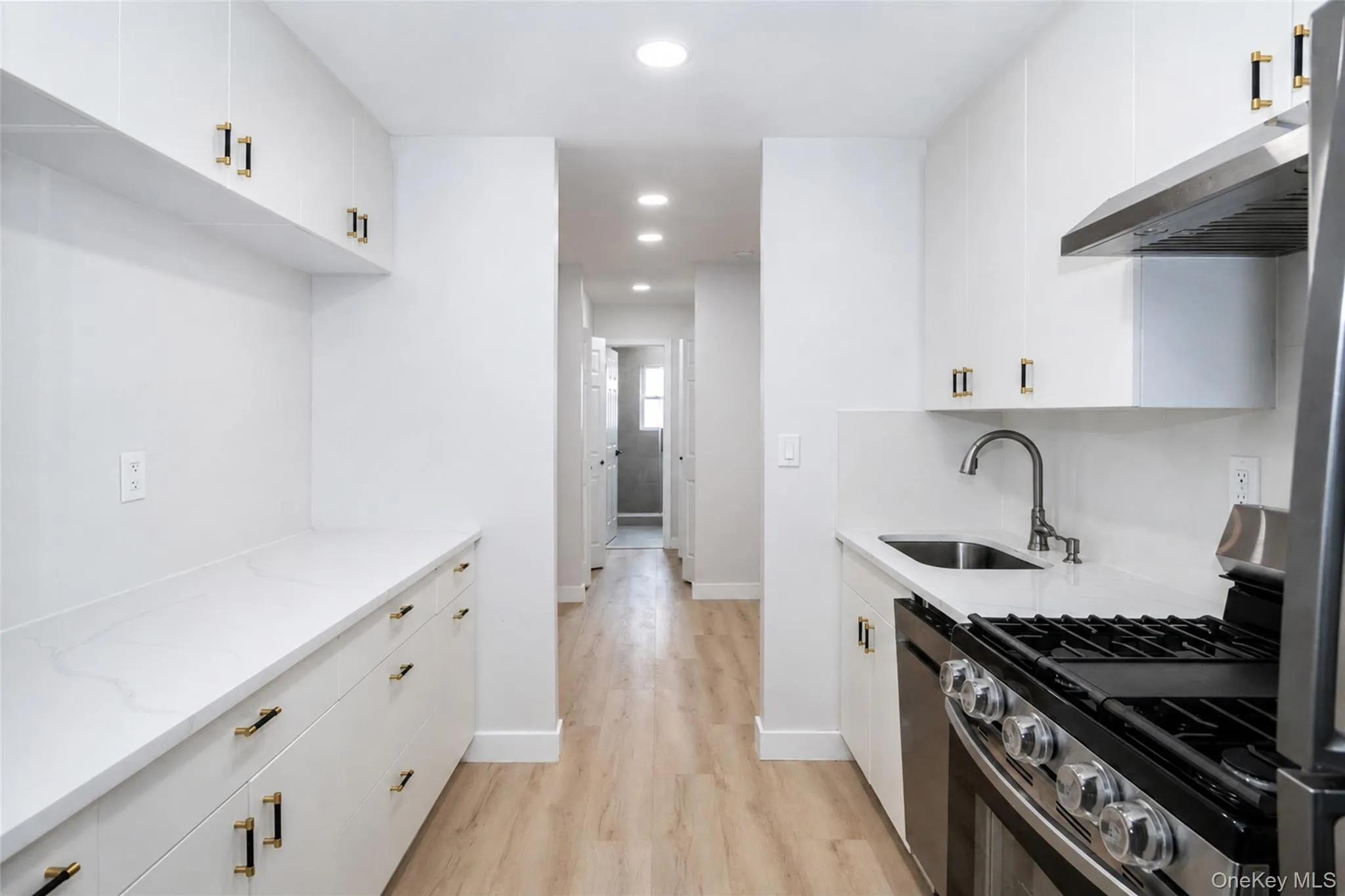 Wood cabinets, quartz counters Wood cabinets, quartz counters