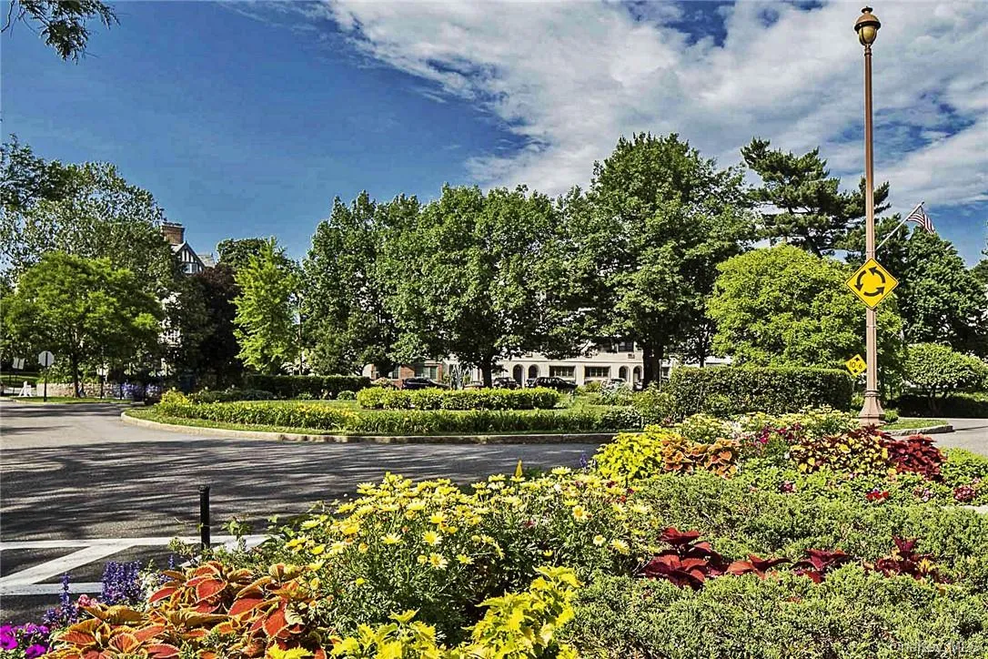 The traffic island in front of NY Presbyterian Hospital is in the heart of the Village The traffic island in front of NY Presbyterian Hospital is in the heart of the Village