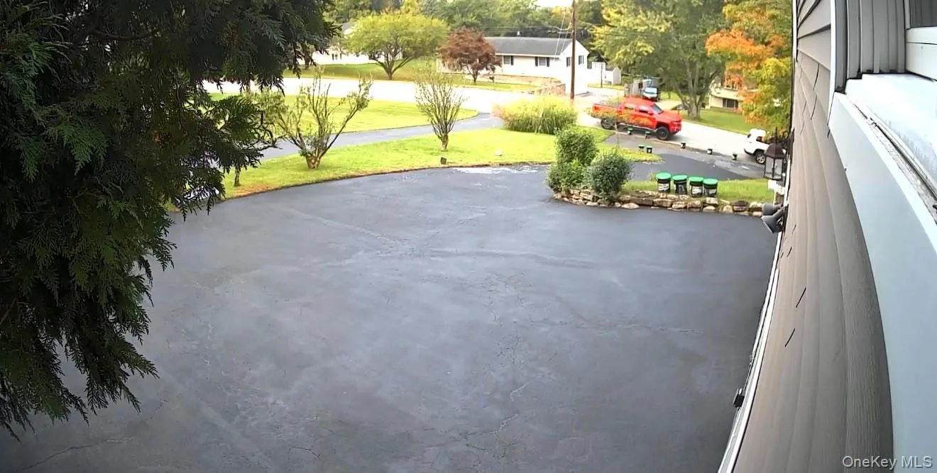 Paved Driveway that would fit atleast 10 cars Paved Driveway that would fit atleast 10 cars