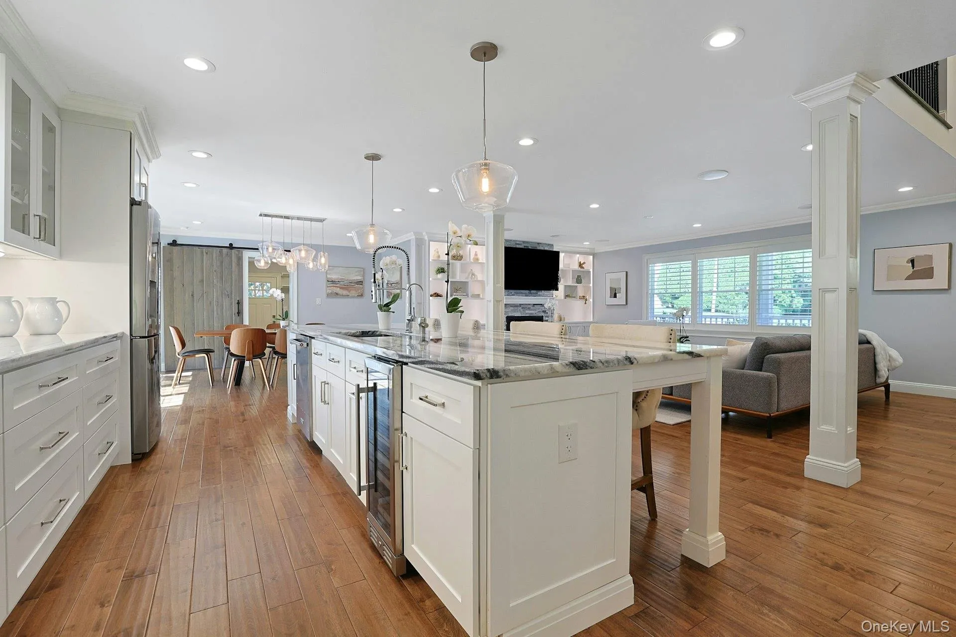 Another view showcasing the kitchen's impressive scale and functionality. Another view showcasing the kitchen's impressive scale and functionality.
