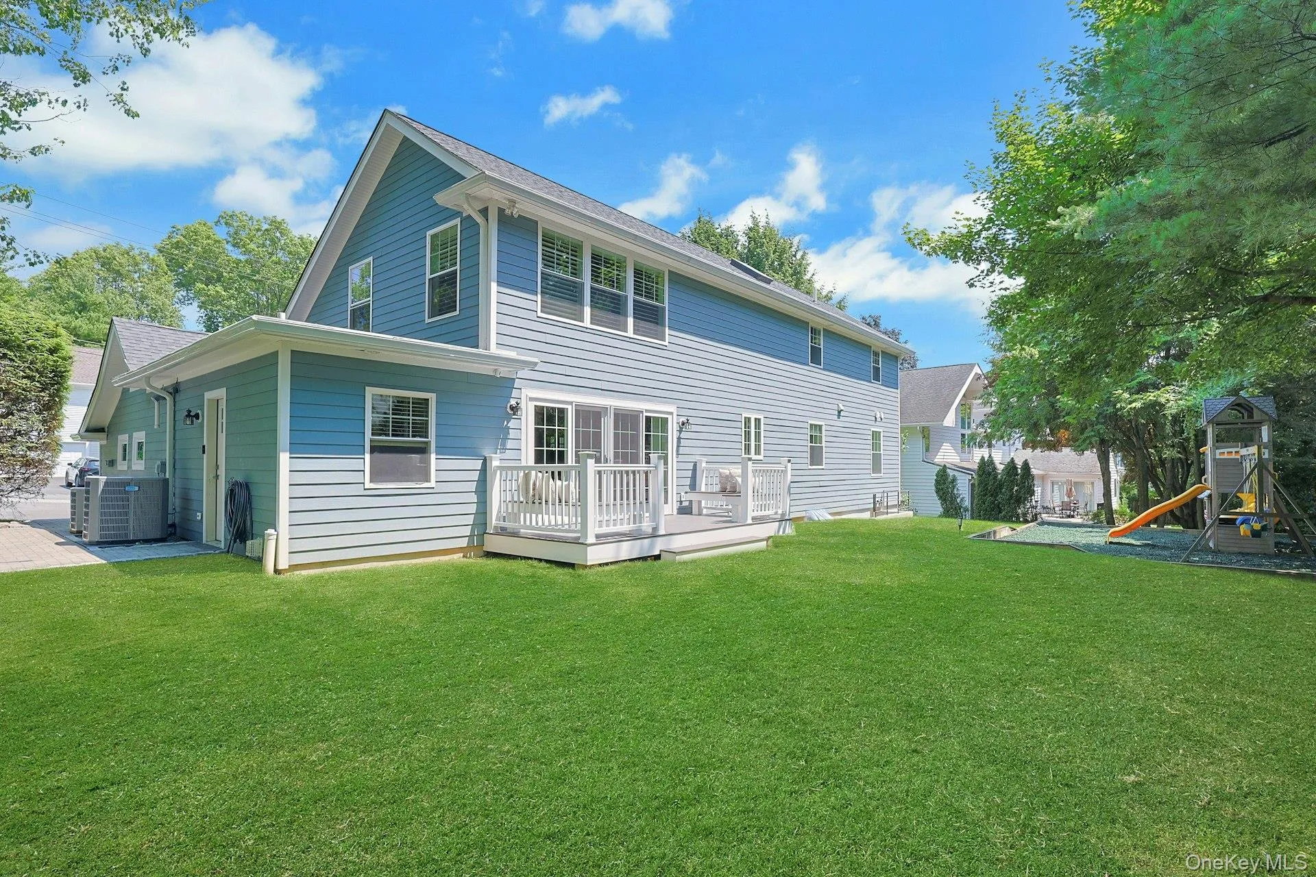 The thoughtfully designed rear elevation showcases the home's wonderful indoor-outdoor flow. The thoughtfully designed rear elevation showcases the home's wonderful indoor-outdoor flow.