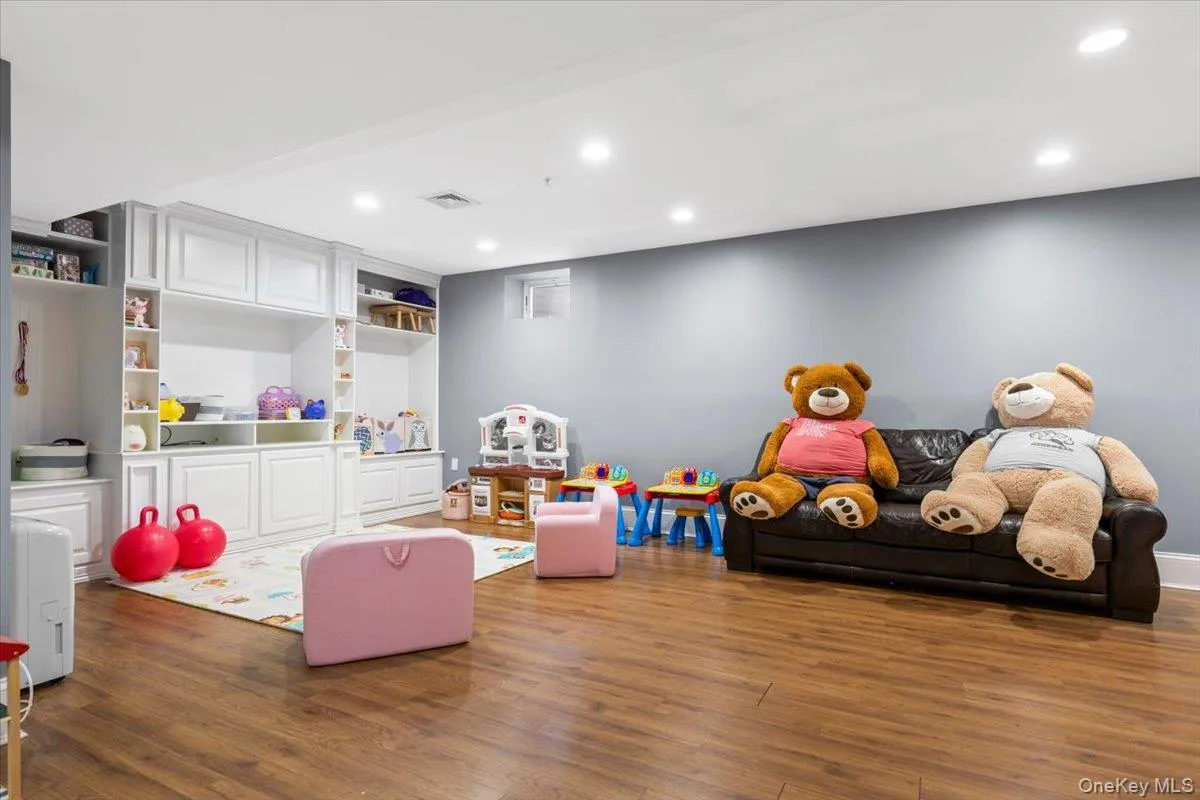 Massive finished walk-out basement configured as a vibrant recreation room. Massive finished walk-out basement configured as a vibrant recreation room.