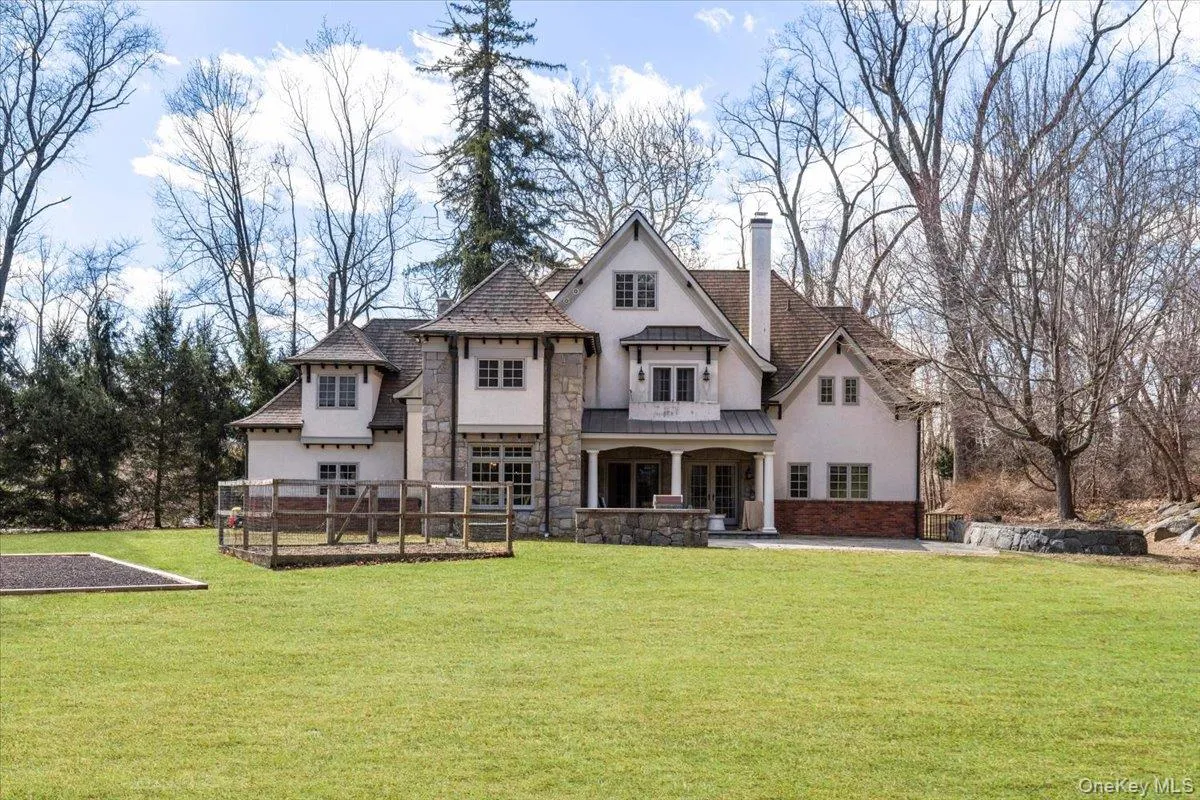 Expansive, flat backyard oasis highlighting a meticulously maintained lawn and exceptional privacy. Expansive, flat backyard oasis highlighting a meticulously maintained lawn and exceptional privacy.